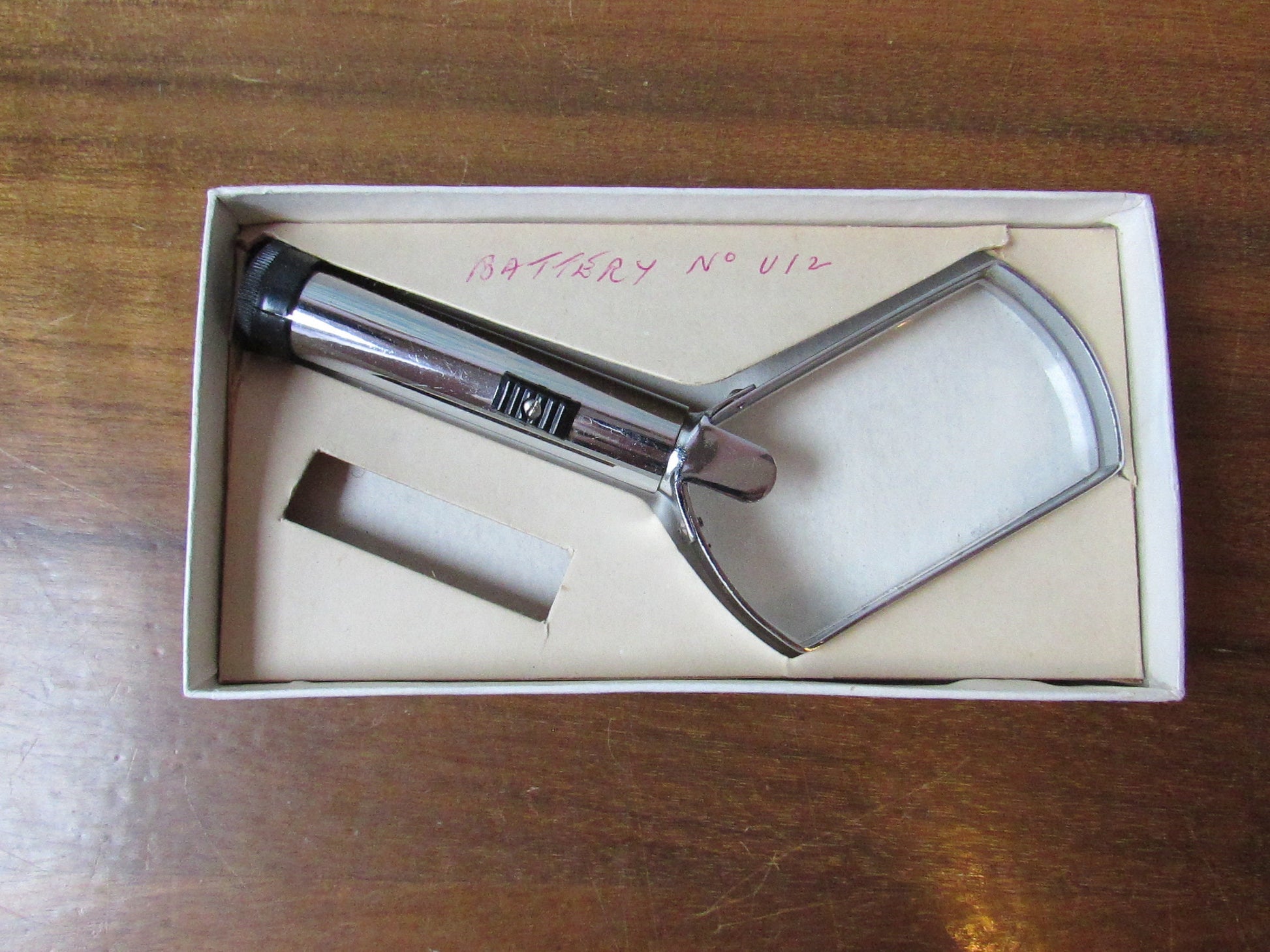 Vintage LSM light reading glass with original packaging