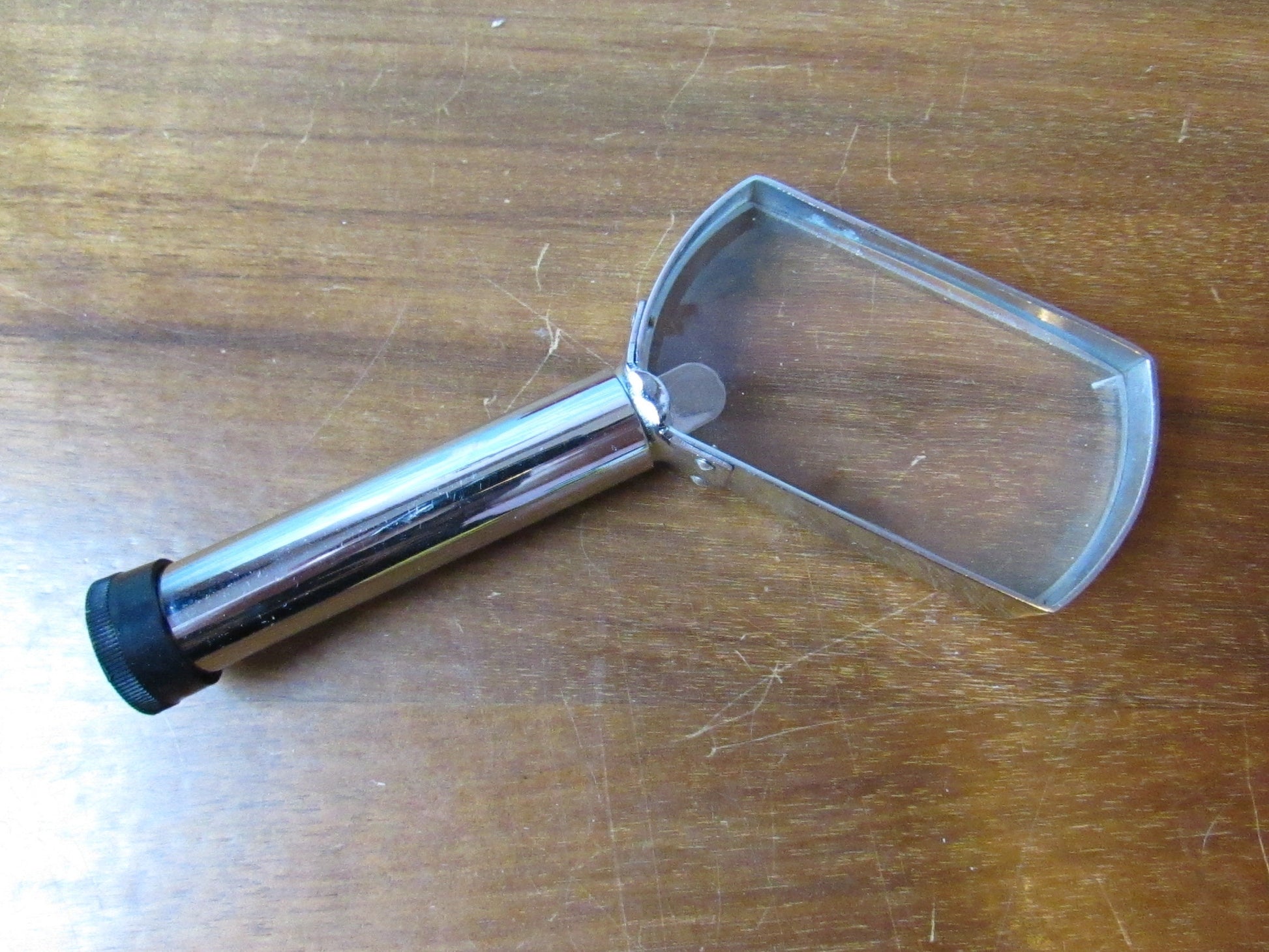 Vintage LSM light reading glass with original packaging