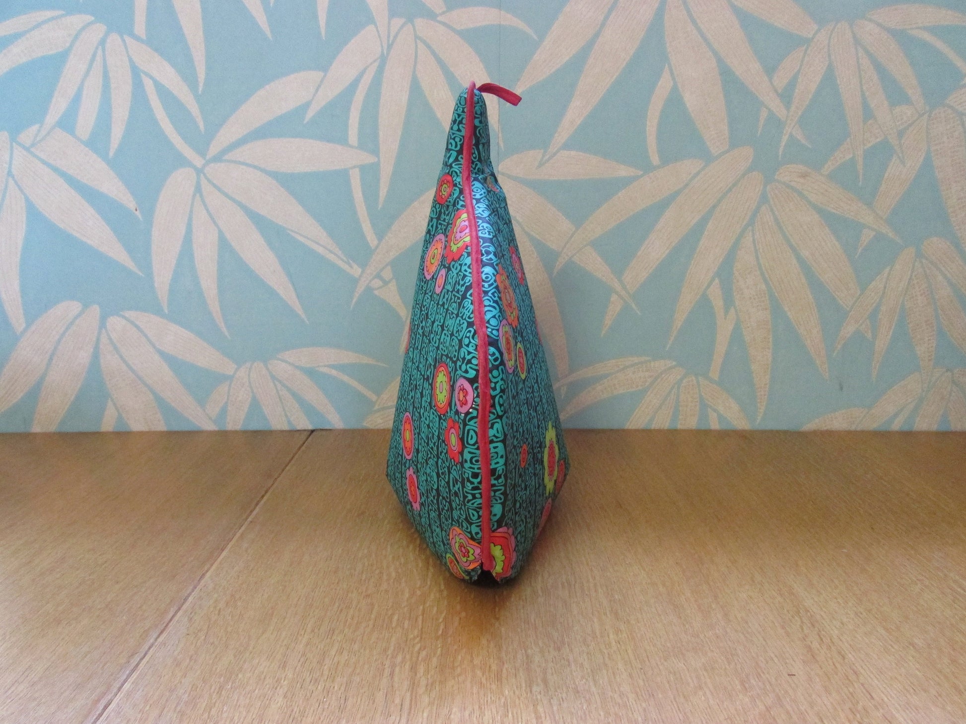 Vintage padded vinyl tea cosy