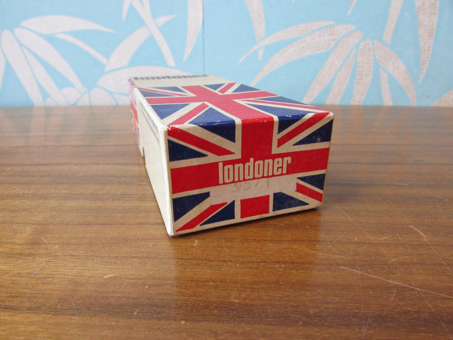 Vintage cardboard Londoner pipe box filled with assorted embroidery threads