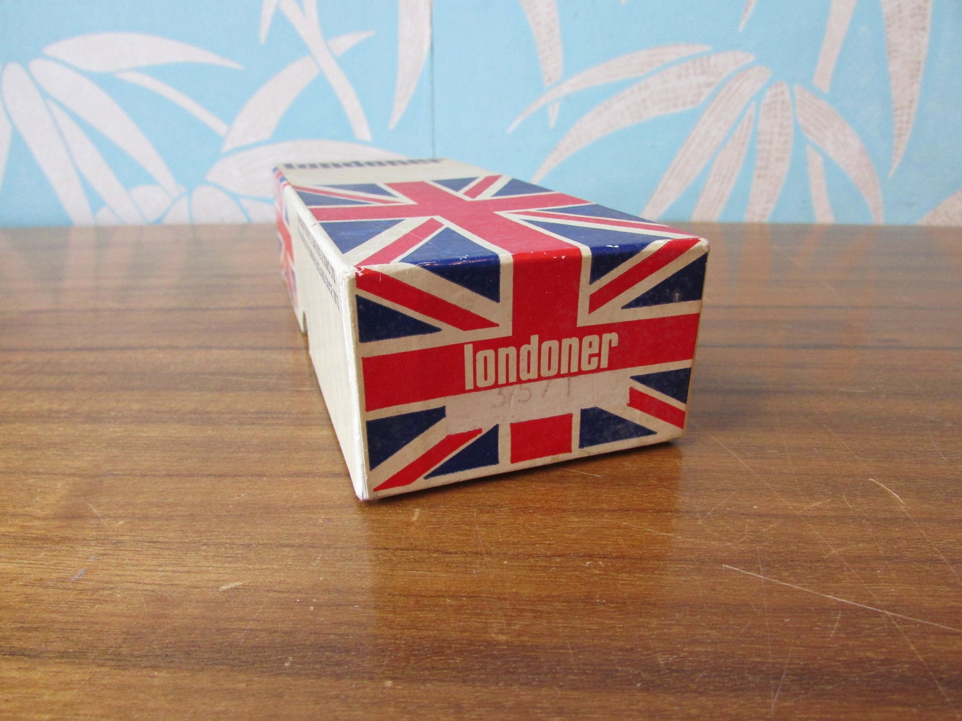 Vintage cardboard Londoner pipe box filled with assorted embroidery threads