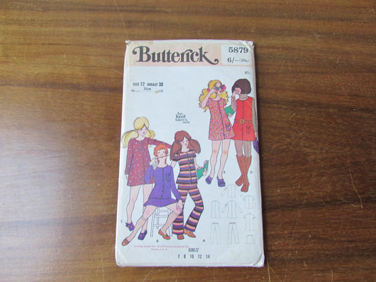 Uncut vintage Butterick 5879 sewing pattern for girls' top, dress or jumper, skirt & pants, size 12 (complete)