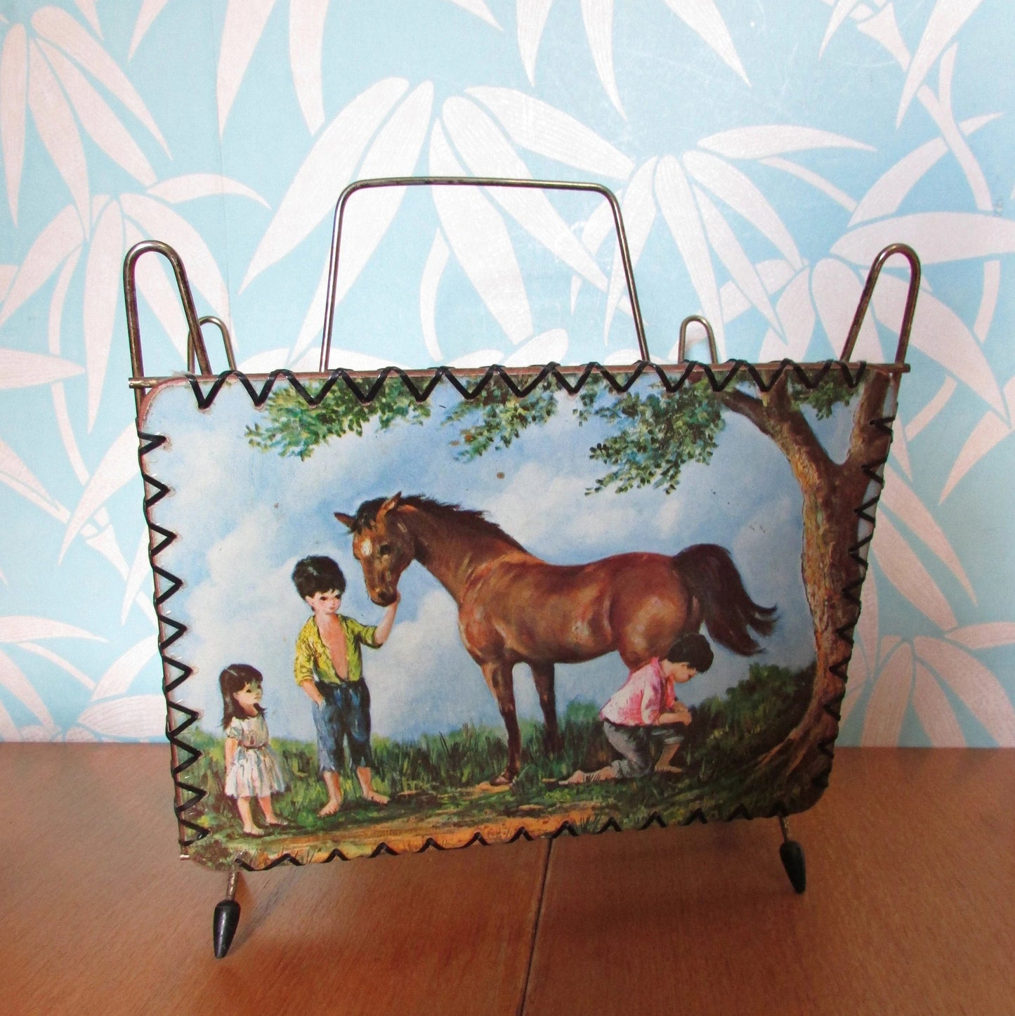 1960s kitsch Dallas Simpson urchin children magazine rack, atomic styling