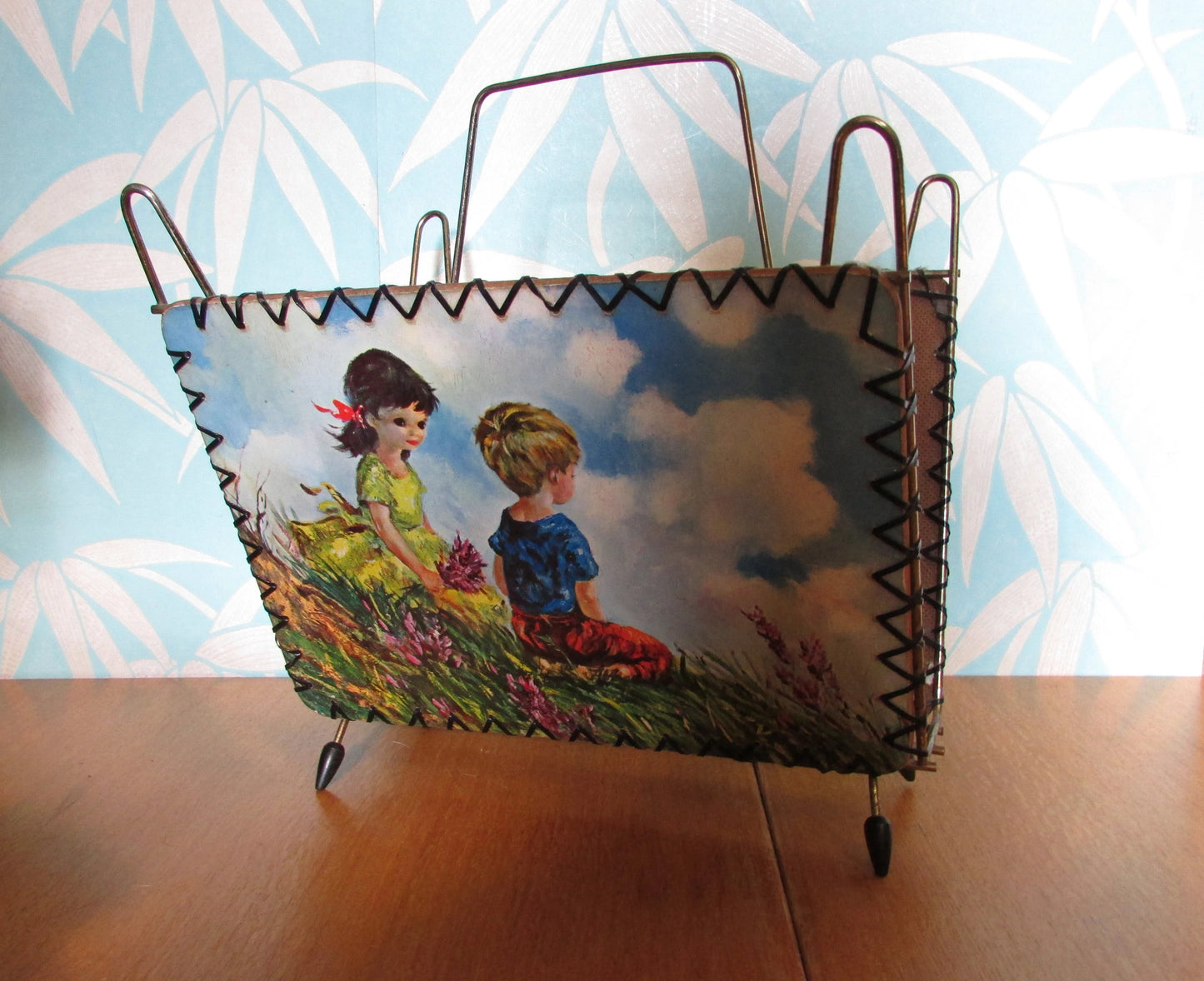 1960s kitsch Dallas Simpson urchin children magazine rack, atomic styling