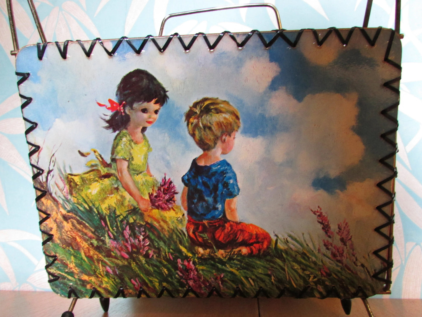 1960s kitsch Dallas Simpson urchin children magazine rack, atomic styling