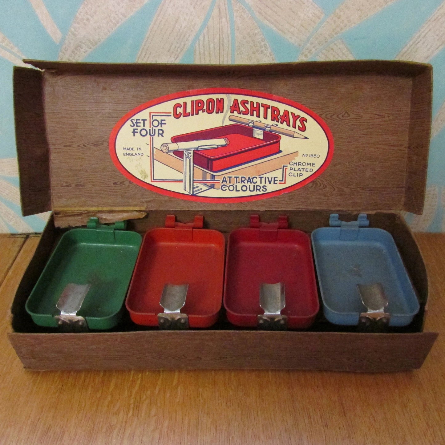 Set of 4 rare vintage coloured metal clip-on ashtrays, made in England