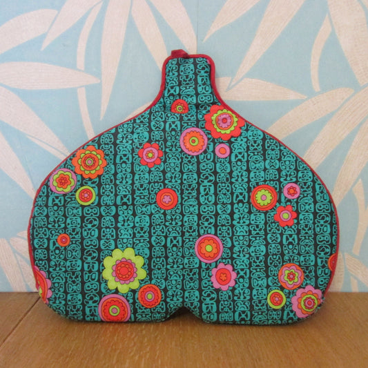 Vintage padded vinyl tea cosy