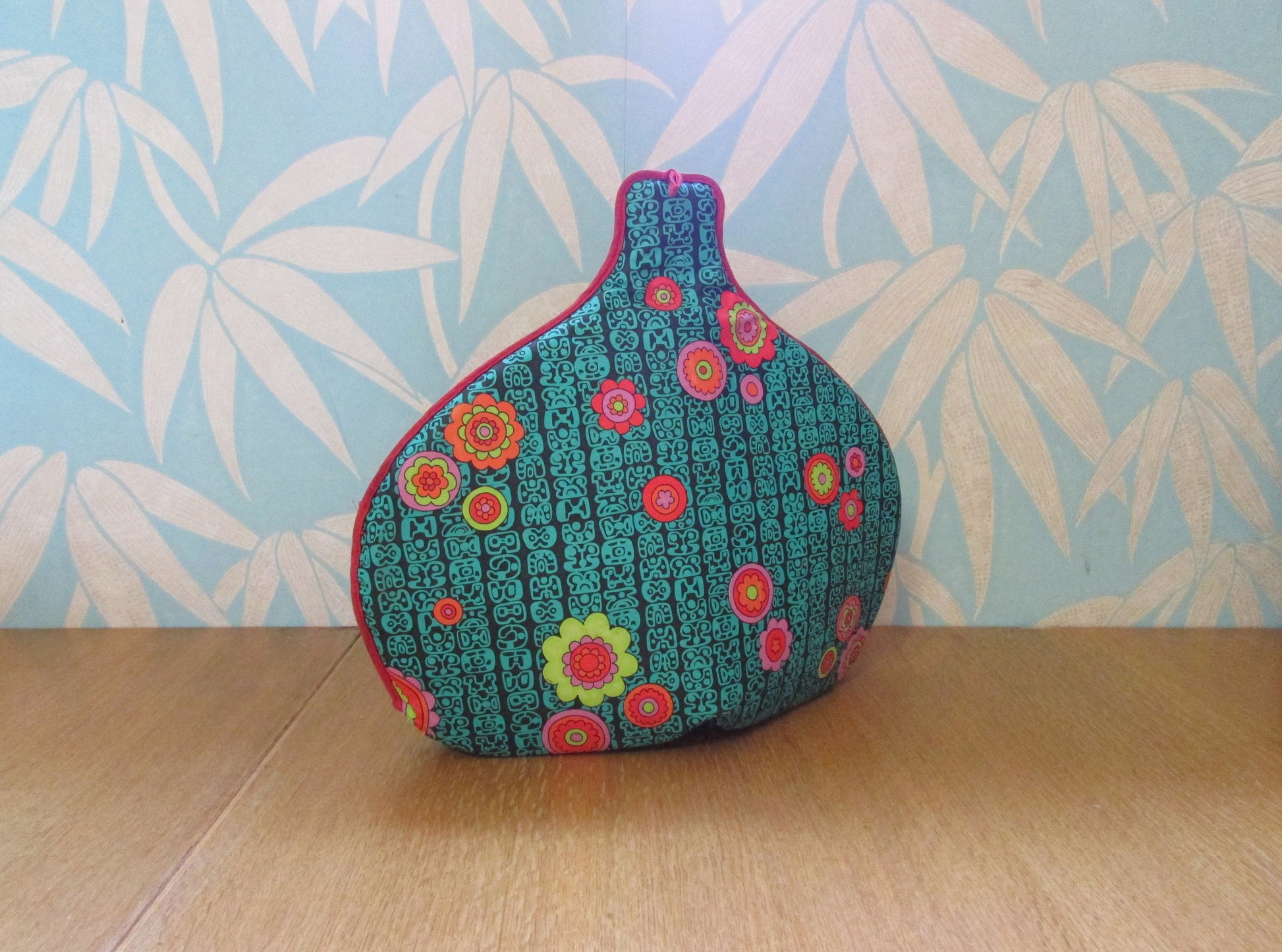 Vintage padded vinyl tea cosy