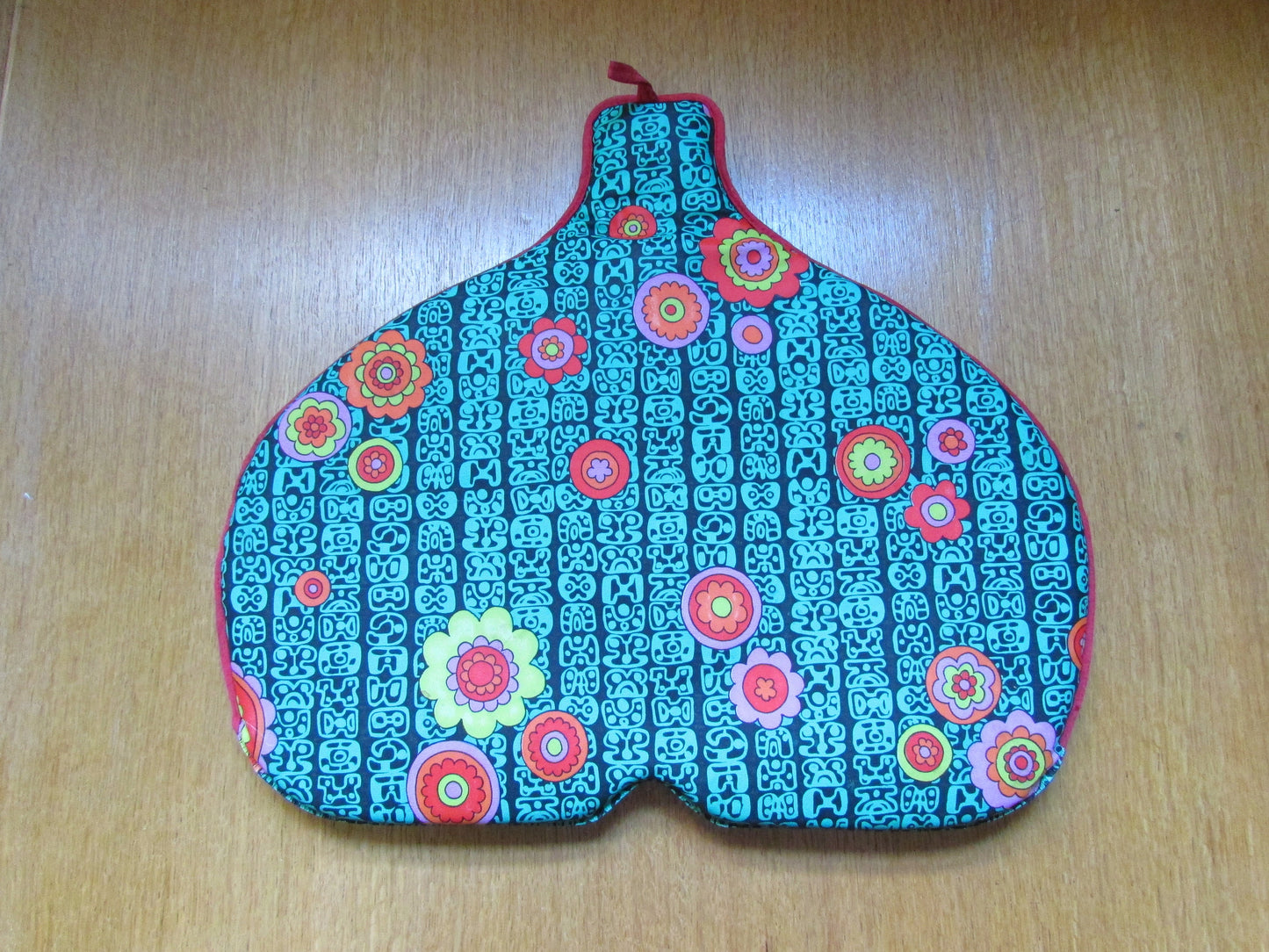 Vintage padded vinyl tea cosy