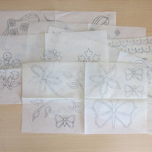 Seven unused assorted vintage corners & borders embroidery transfers