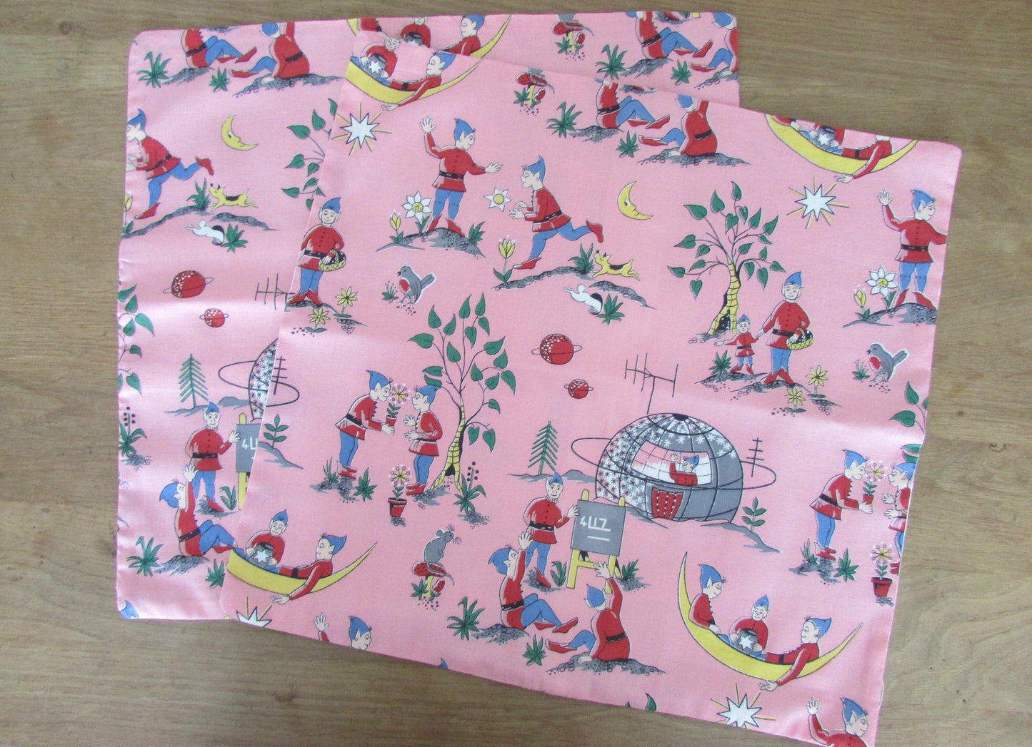 Home-made mid-century pink elf land cushion cover with contrast reverse