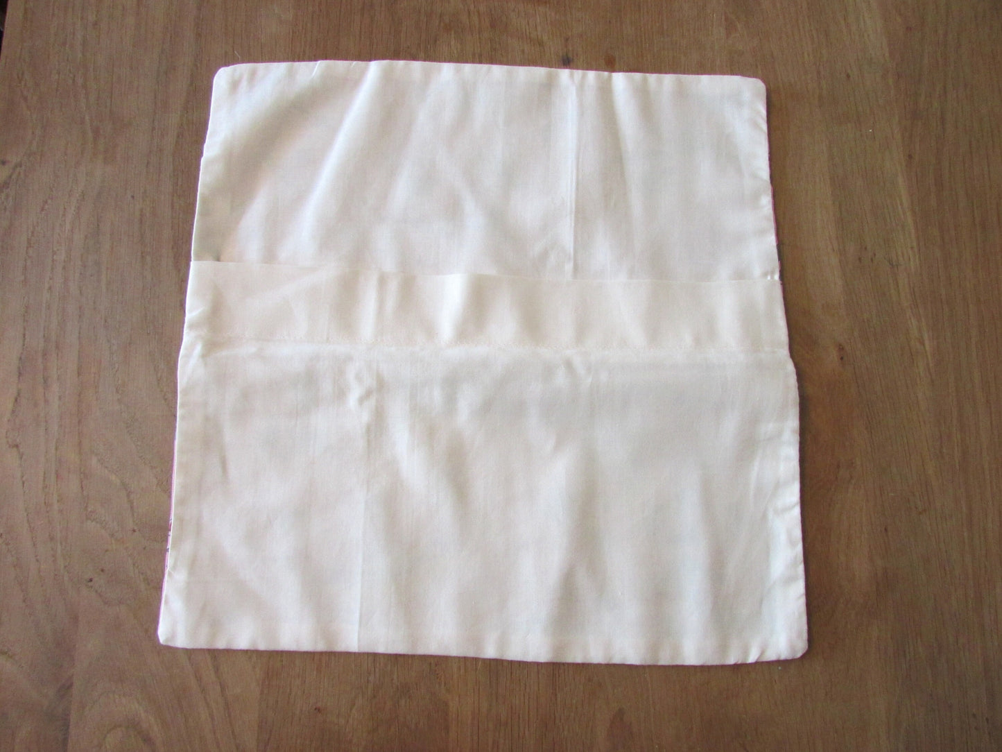 Home-made mid-century pink elf land cushion cover with contrast reverse