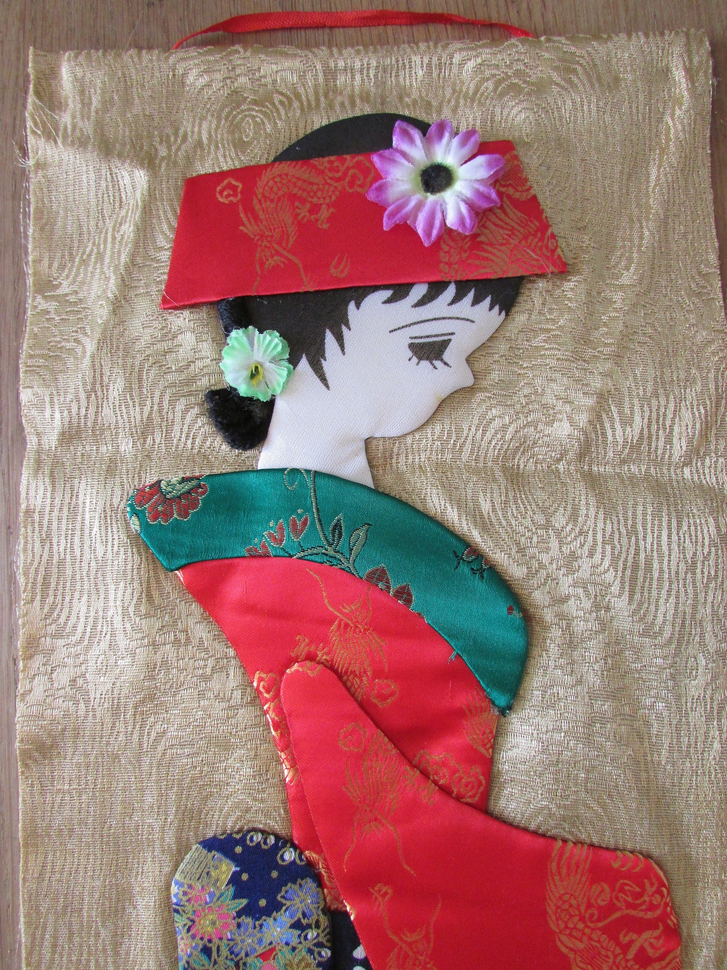 Vintage applique scroll wall hanging of Japanese geisha