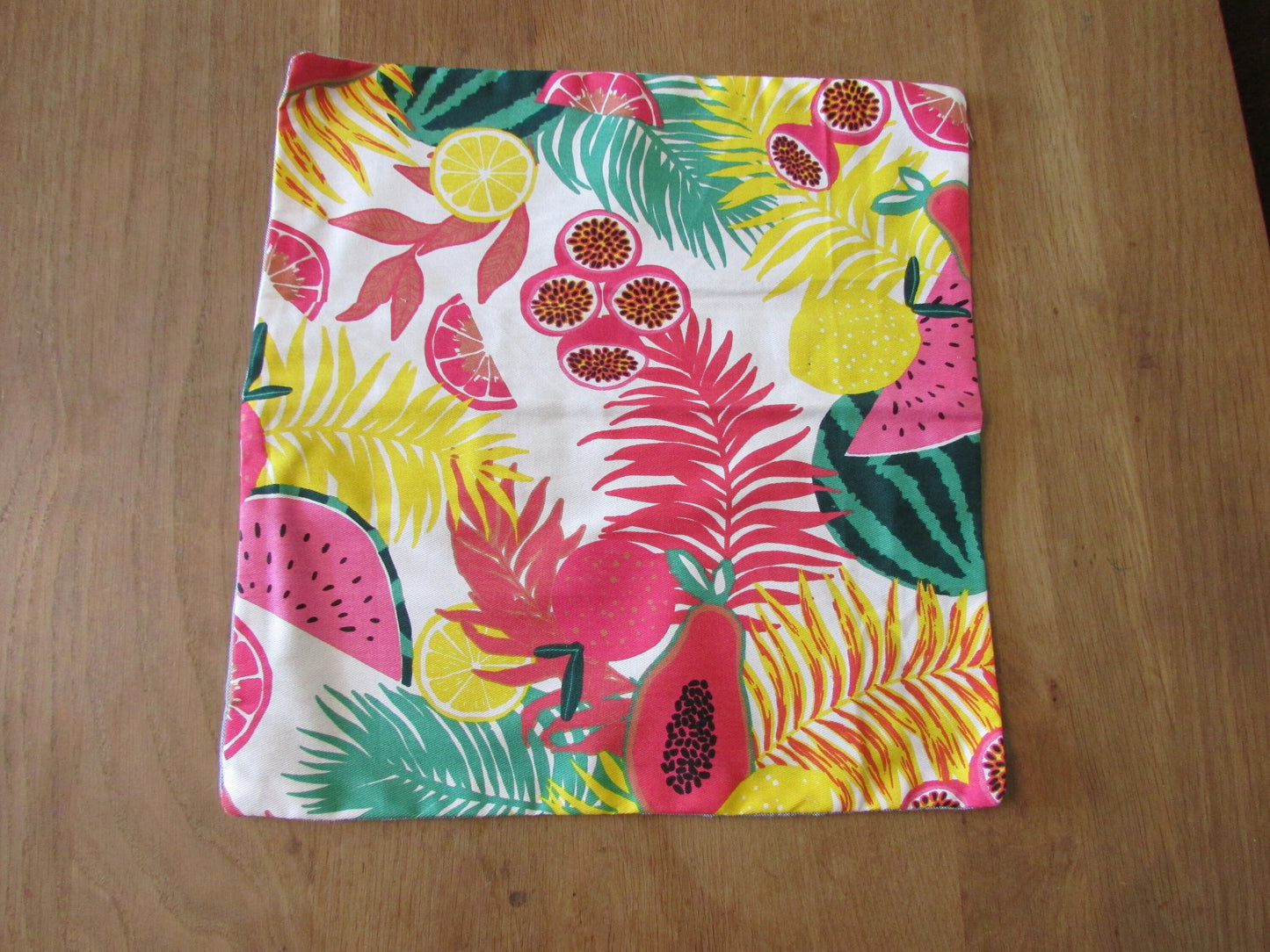 Home-made retro bright tropical print cushion cover with contrast eau de nil reverse