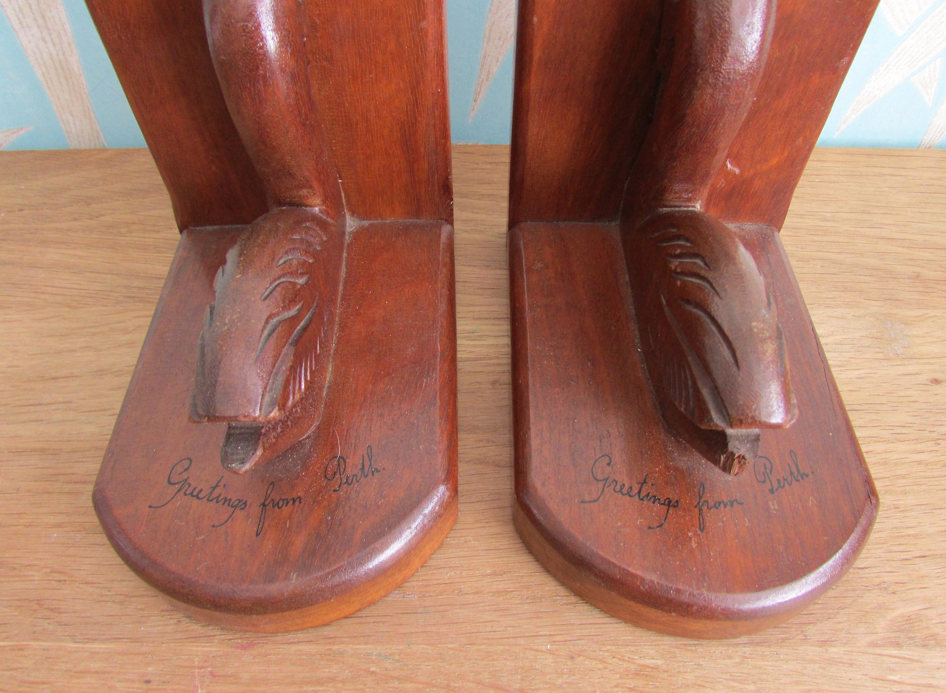 Pair of Art Deco "Greetings from Perth" wooden Pelican bookends