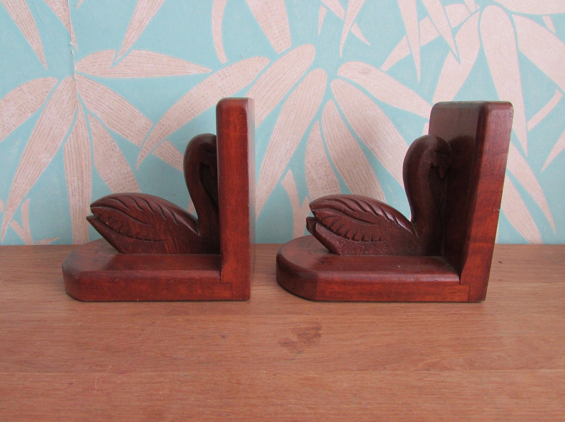Pair of Art Deco "Greetings from Perth" wooden Pelican bookends