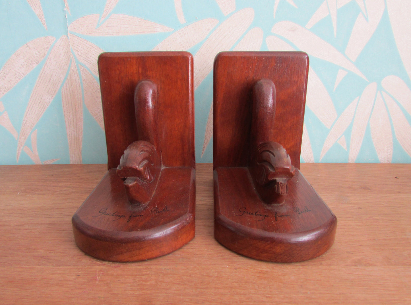 Pair of Art Deco "Greetings from Perth" wooden Pelican bookends
