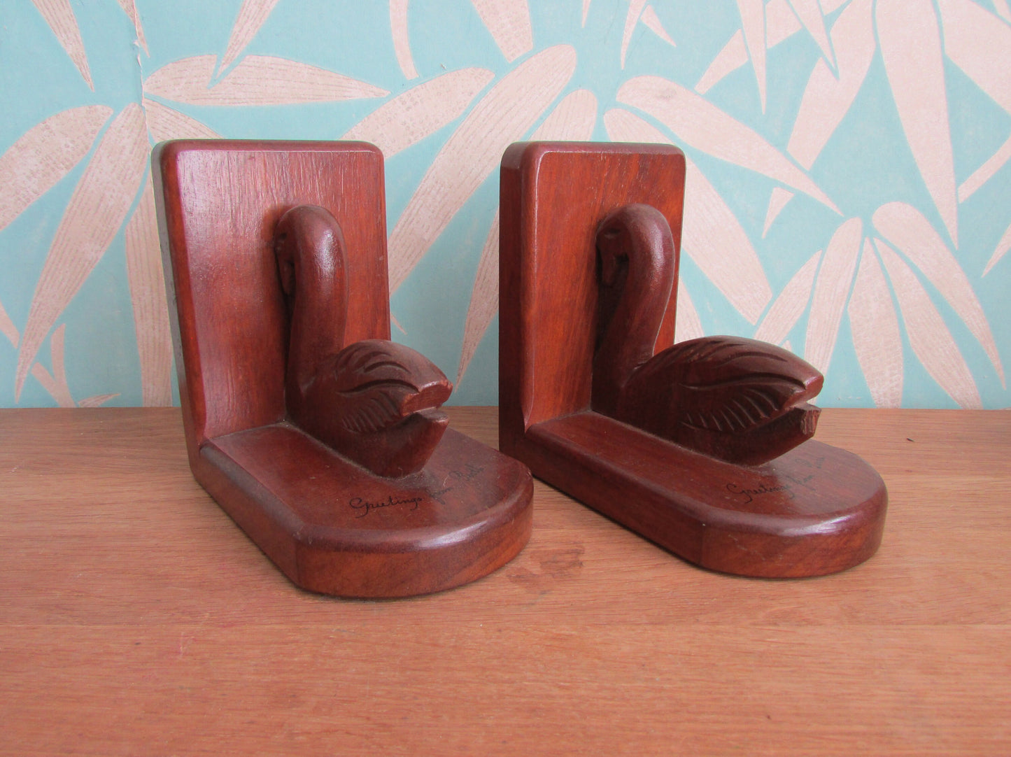 Pair of Art Deco "Greetings from Perth" wooden Pelican bookends