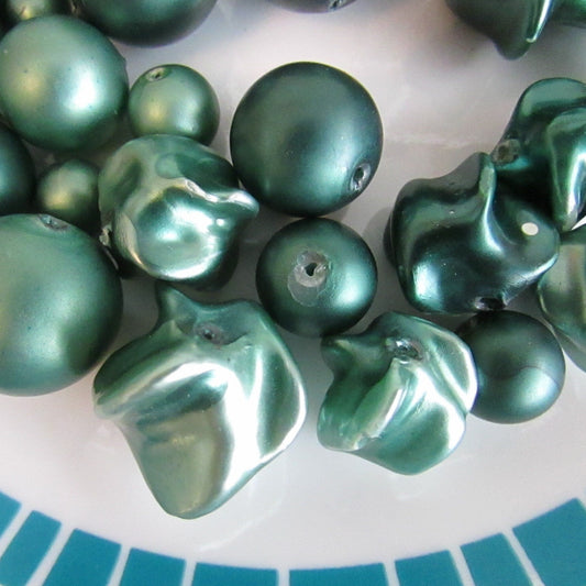 60 vintage pearlescent green plastic round & pinched beads, assorted sizes