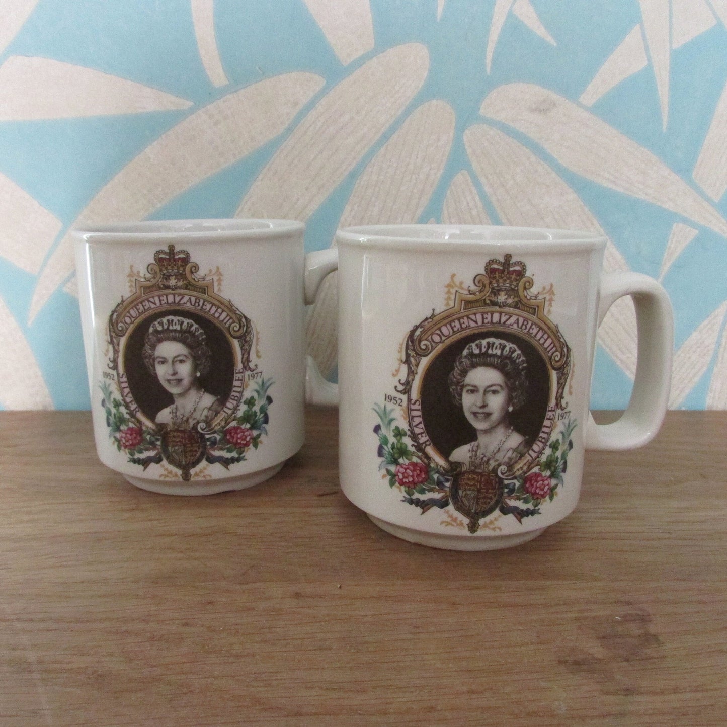 Pair of 1977 Winchcombe Pottery Queen Elizabeth commemorative Silver Jubilee mugs