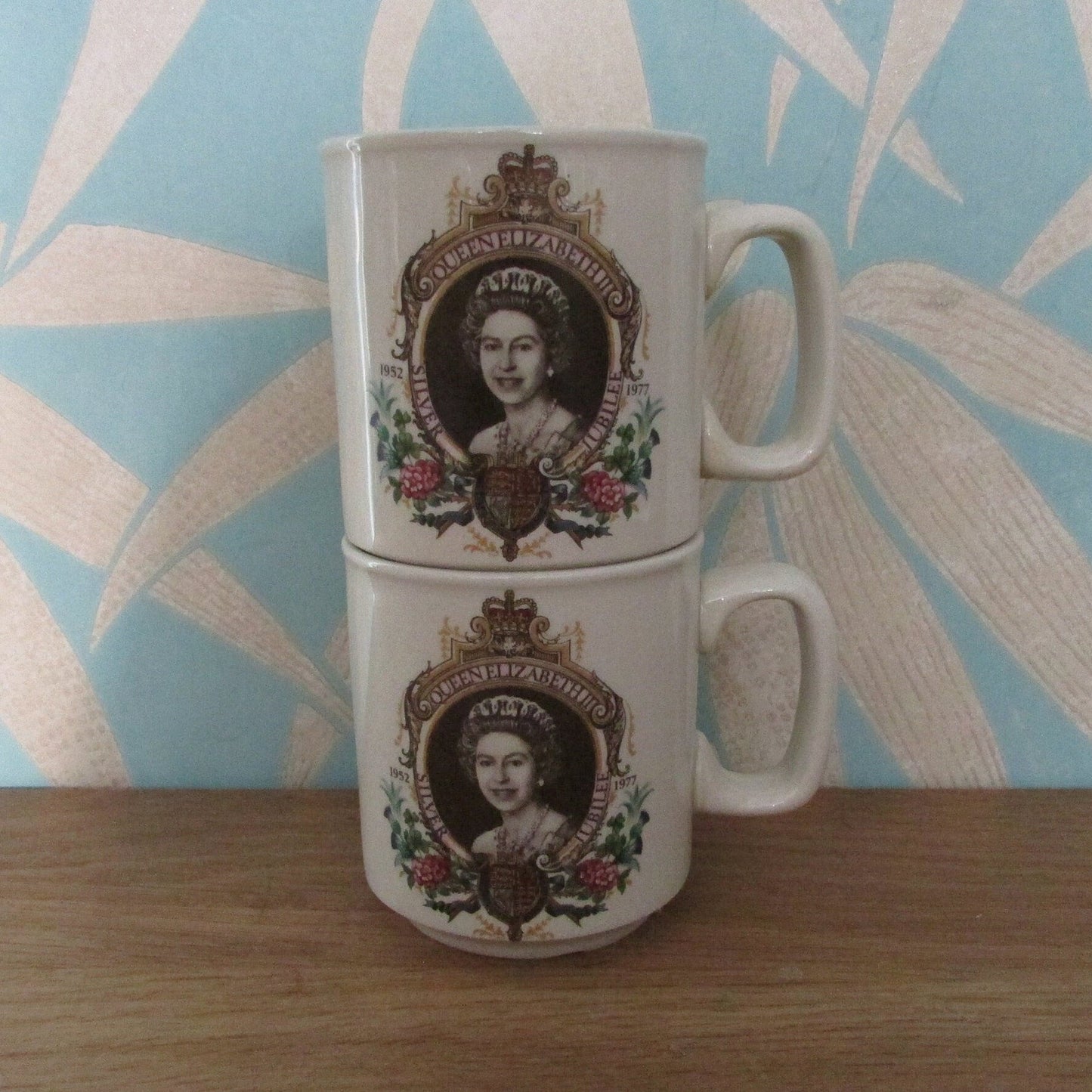 Pair of 1977 Winchcombe Pottery Queen Elizabeth commemorative Silver Jubilee mugs