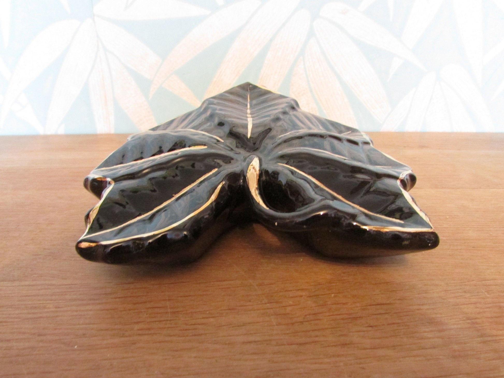 Vintage black & gold maple leaf wall pocket/vase, marked 22 carat gold