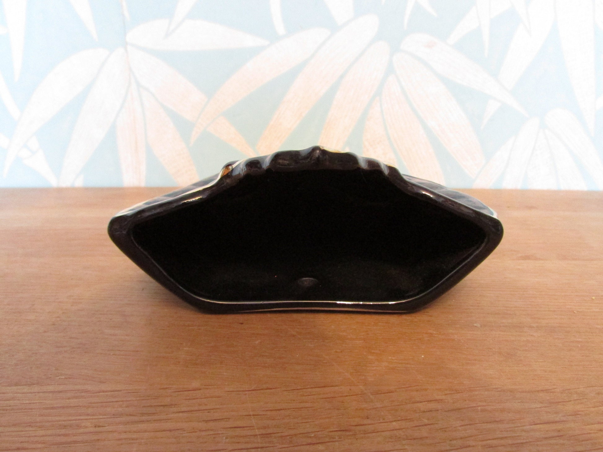 Vintage black & gold maple leaf wall pocket/vase, marked 22 carat gold