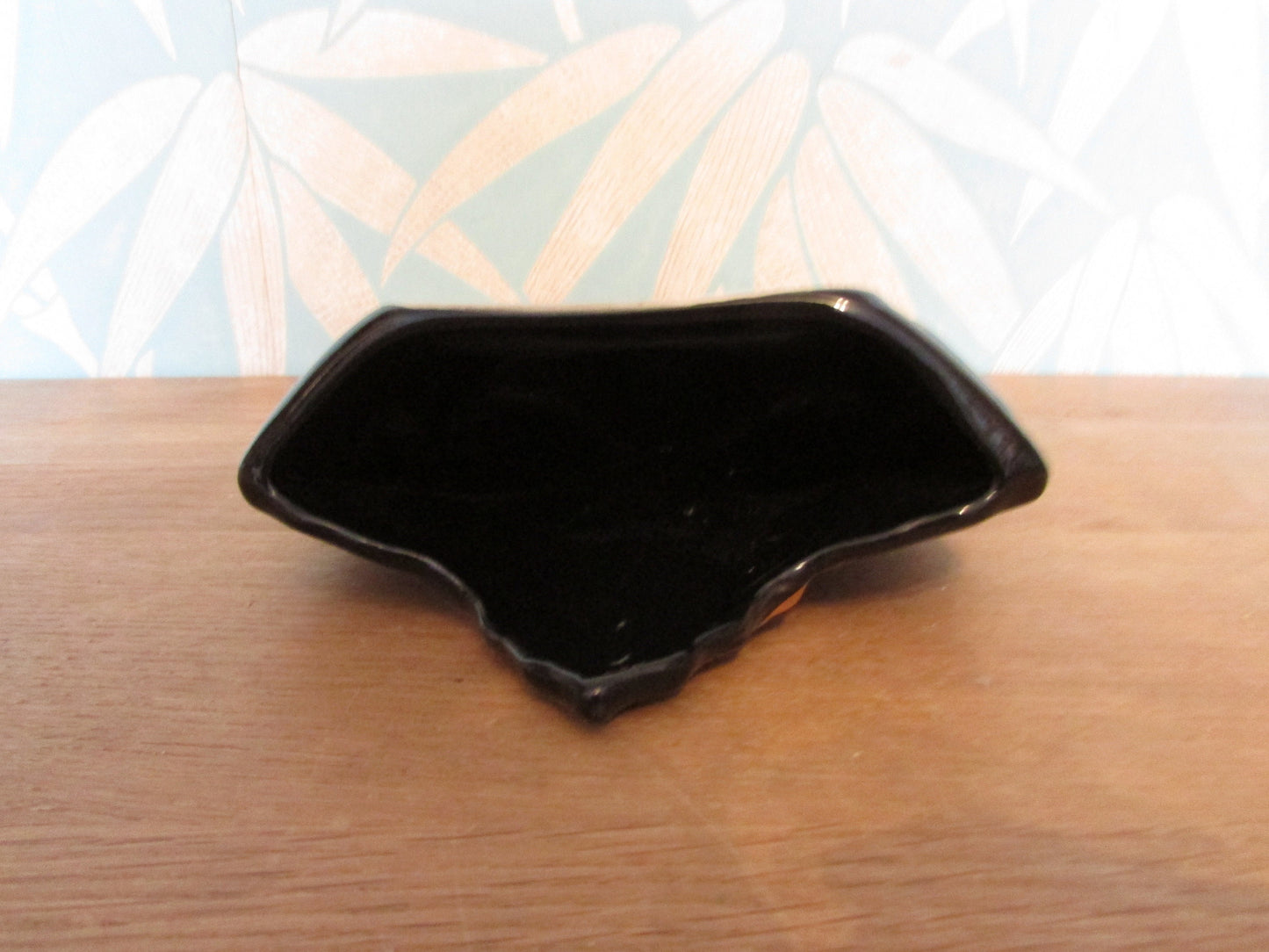 Vintage black & gold maple leaf wall pocket/vase, marked 22 carat gold