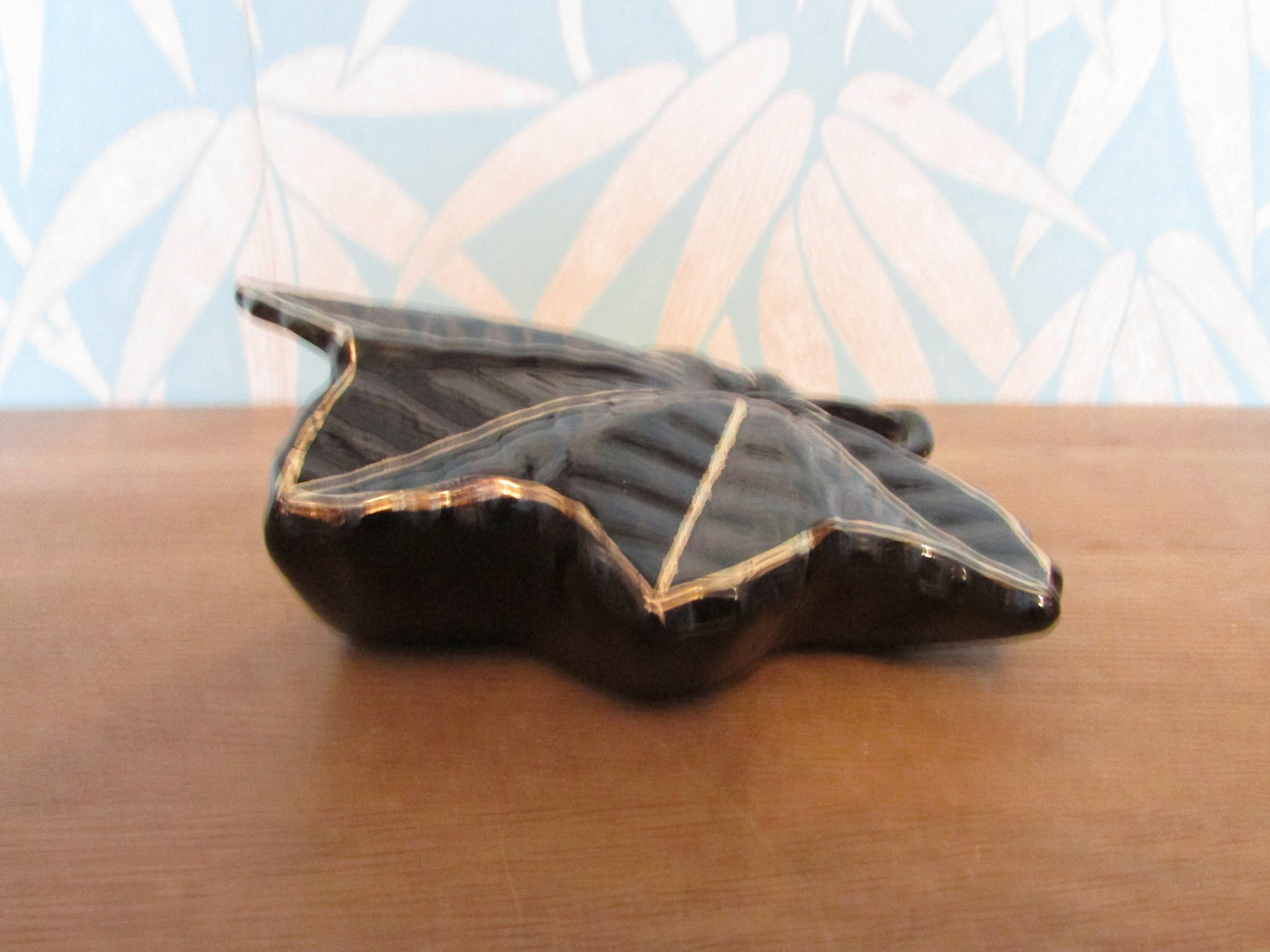 Vintage black & gold maple leaf wall pocket/vase, marked 22 carat gold