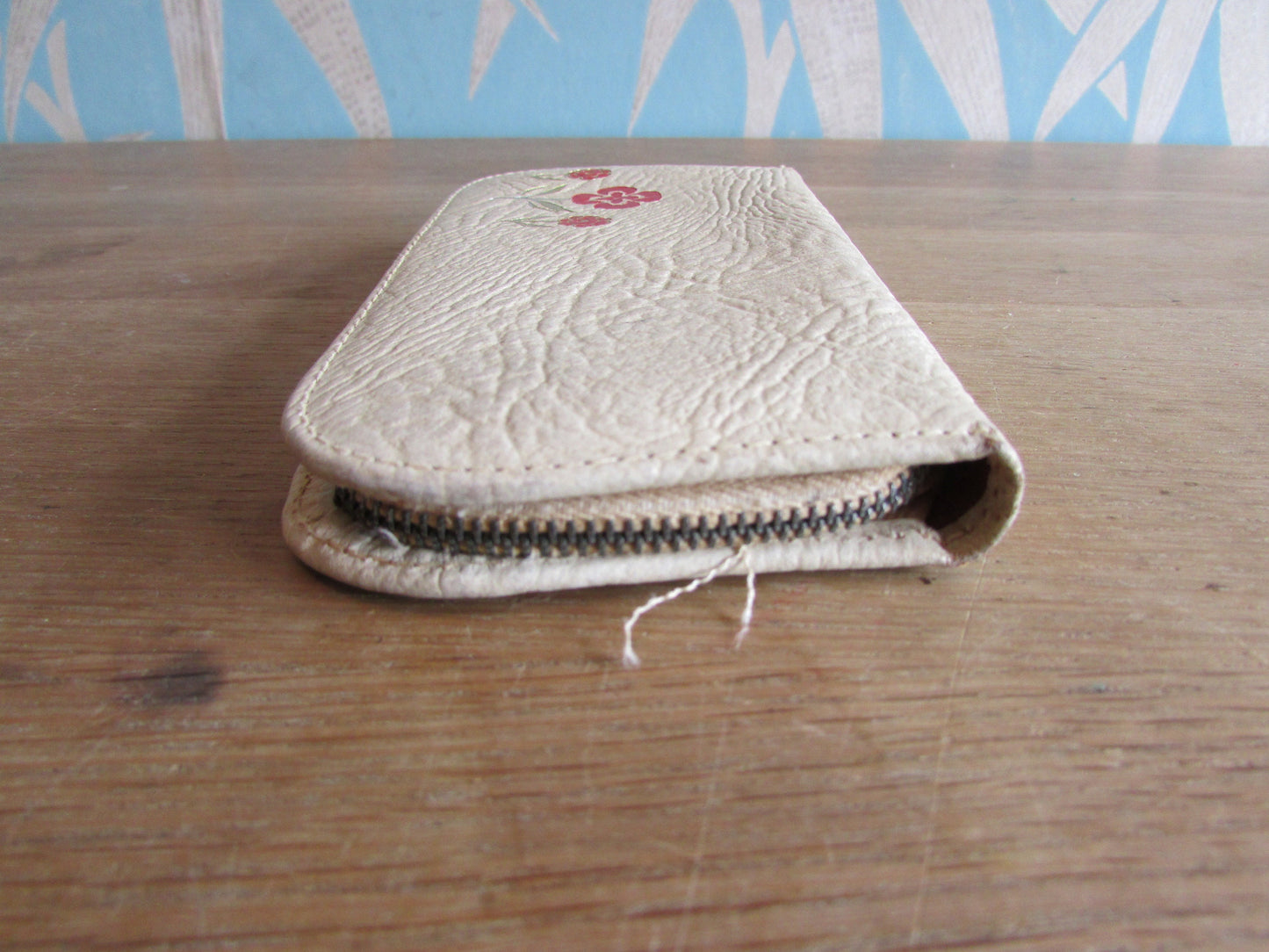 1950s manicure set in zipped leather travel case with red & gold flower detail