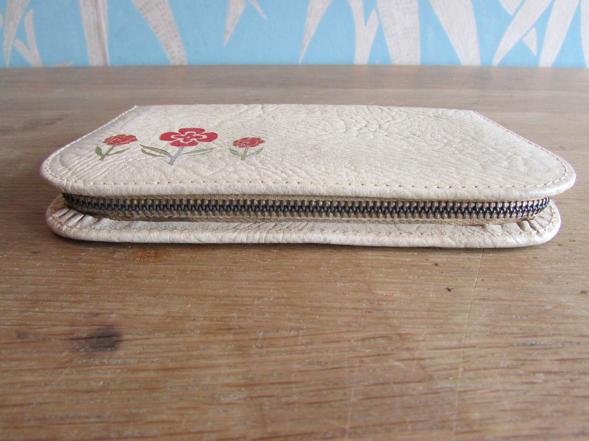 1950s manicure set in zipped leather travel case with red & gold flower detail