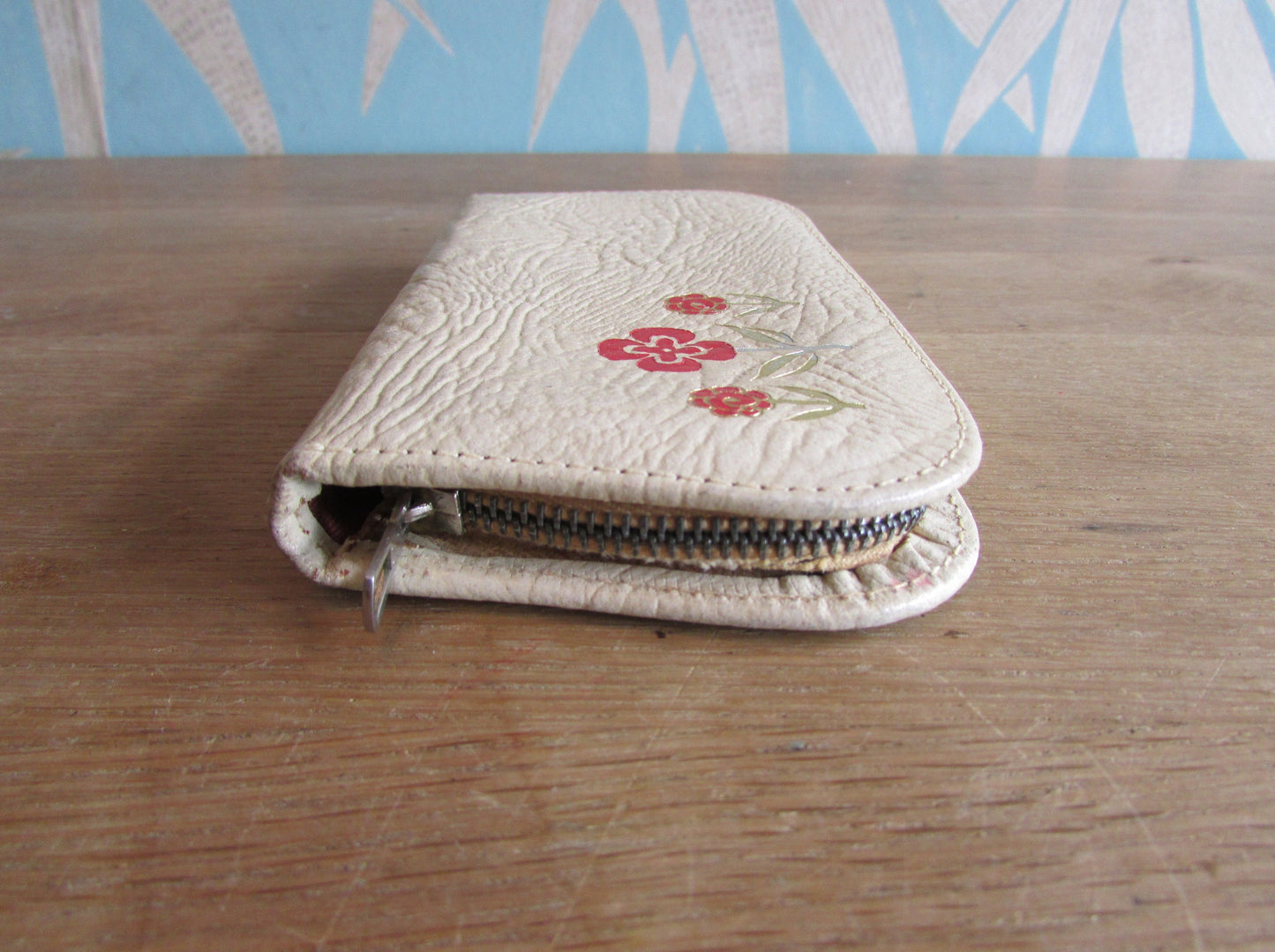 1950s manicure set in zipped leather travel case with red & gold flower detail