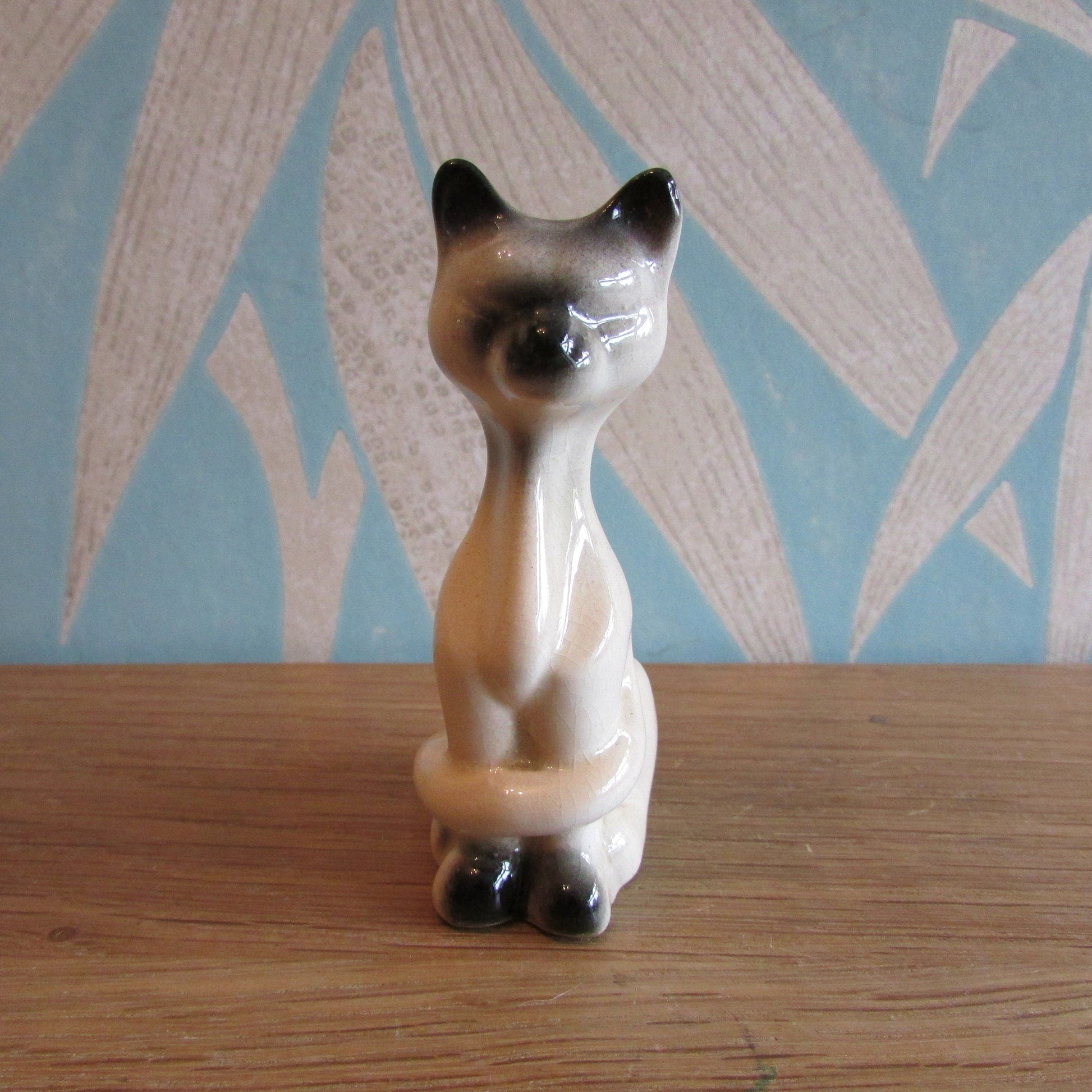 Vintage ceramic Siamese cat figurine