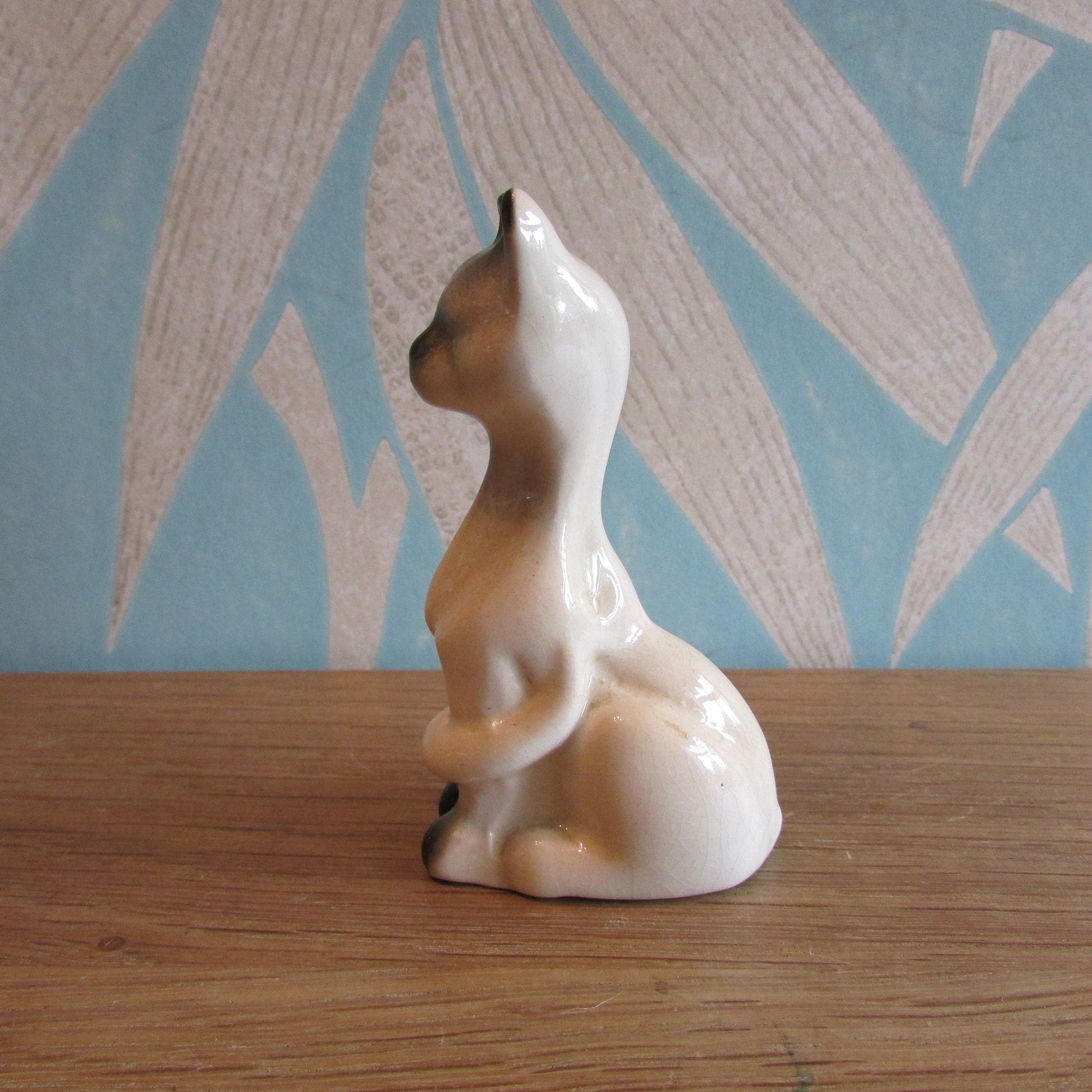 Vintage ceramic Siamese cat figurine