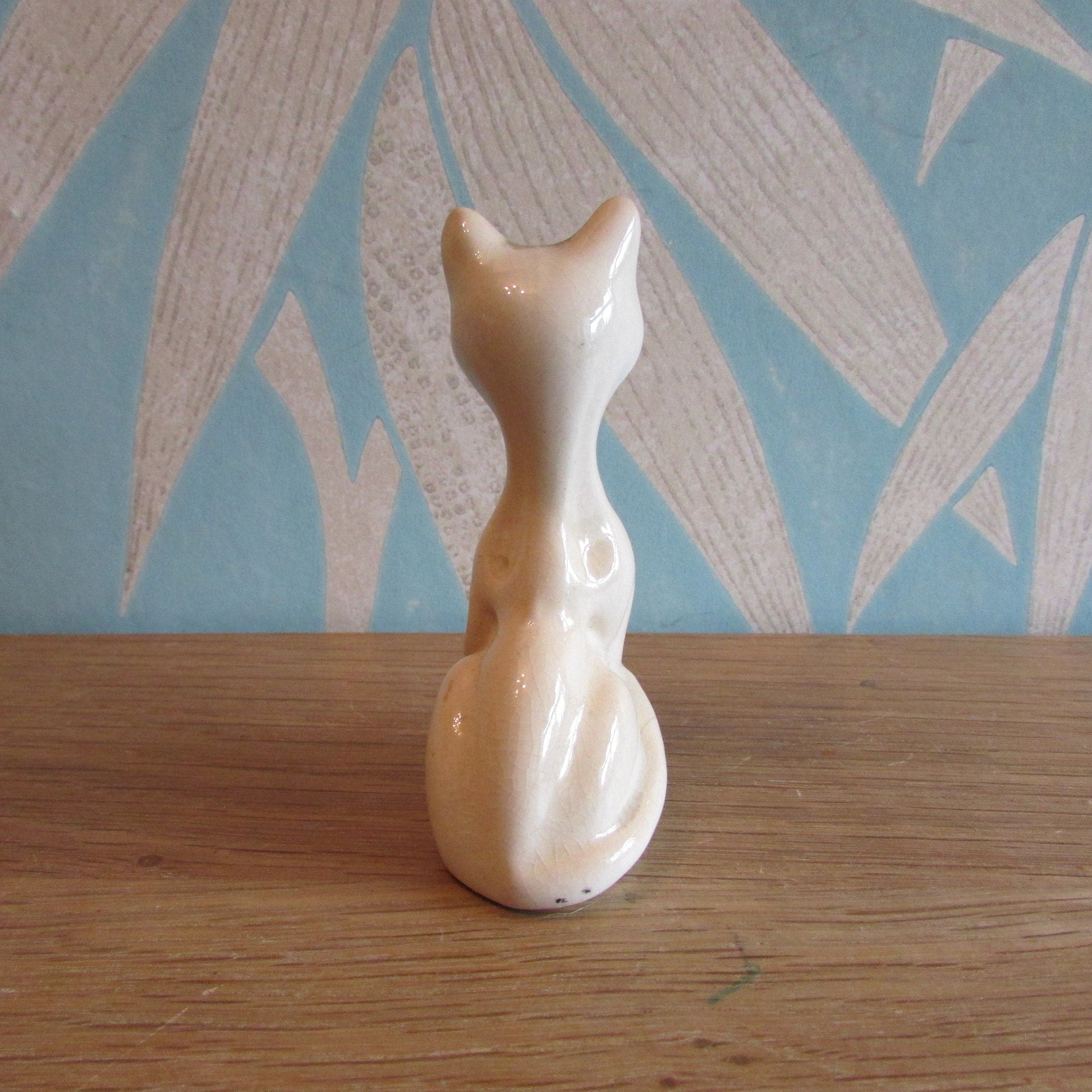 Vintage ceramic Siamese cat figurine