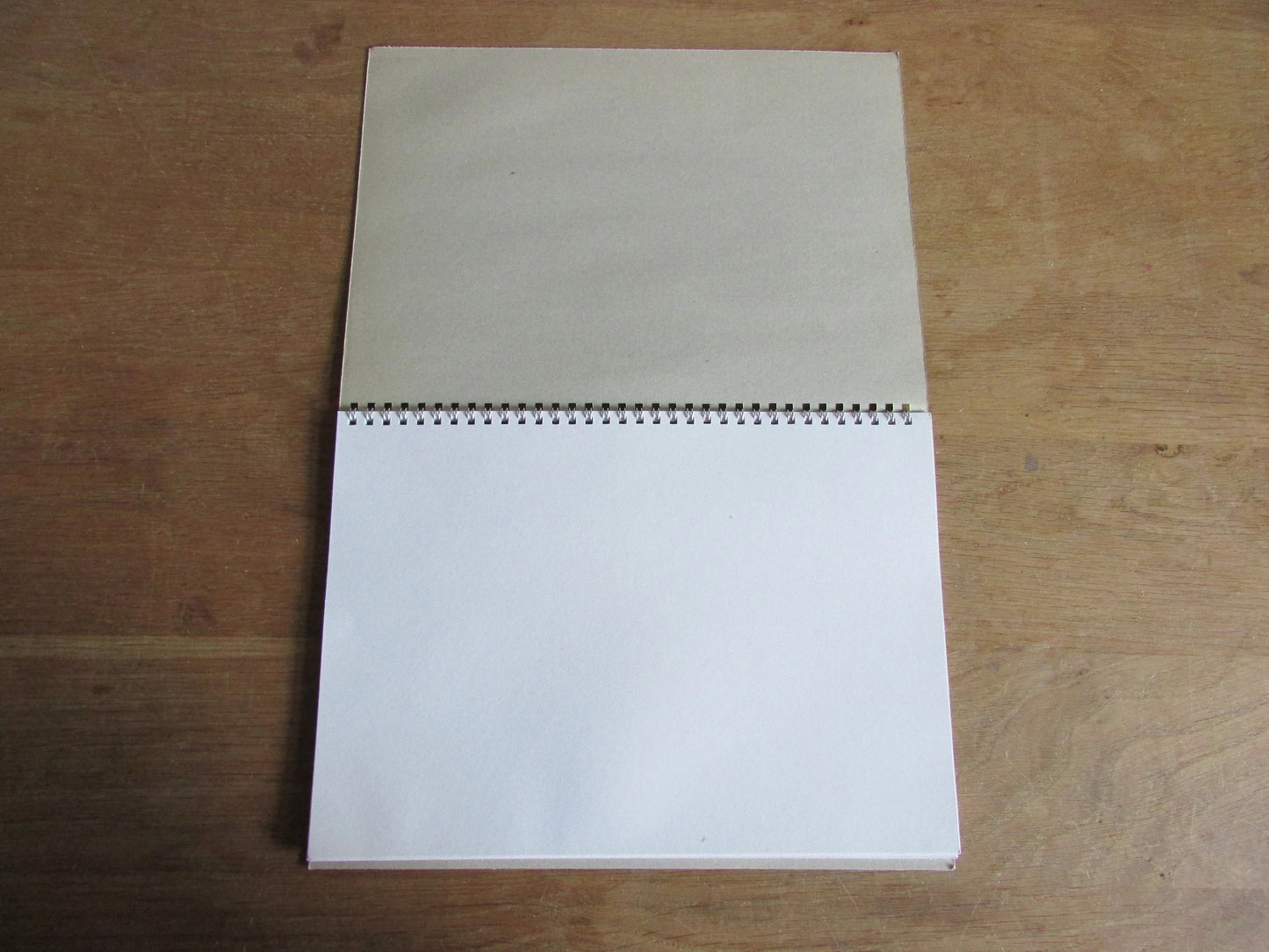 Home-made A4 wire-bound sketchbook using 100% recycled 140gsm Cartridge Paper, Mona Lisa, blue