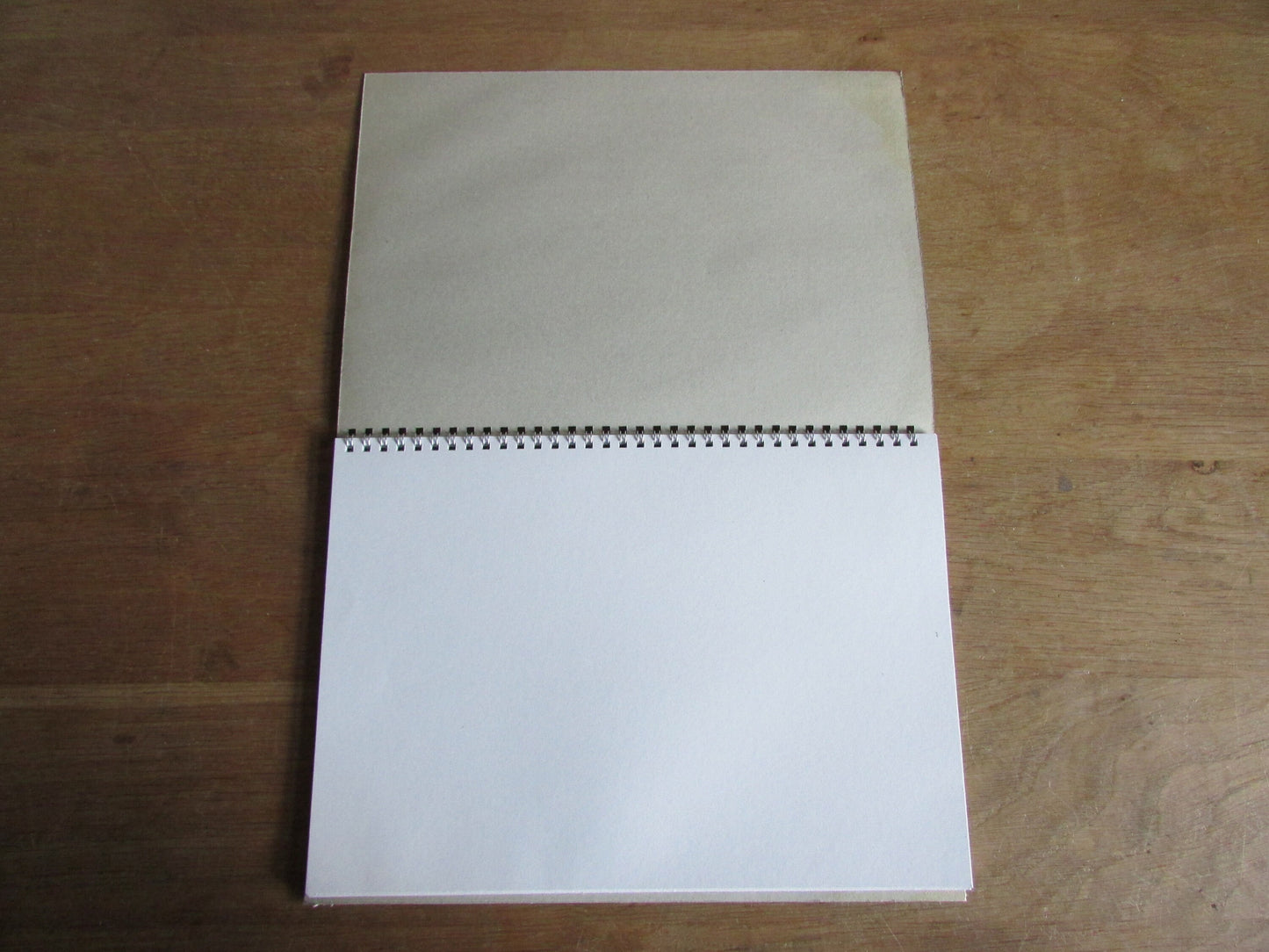Home-made A4 wire-bound sketchbook using 100% recycled 140gsm Cartridge Paper, Mona Lisa, pink