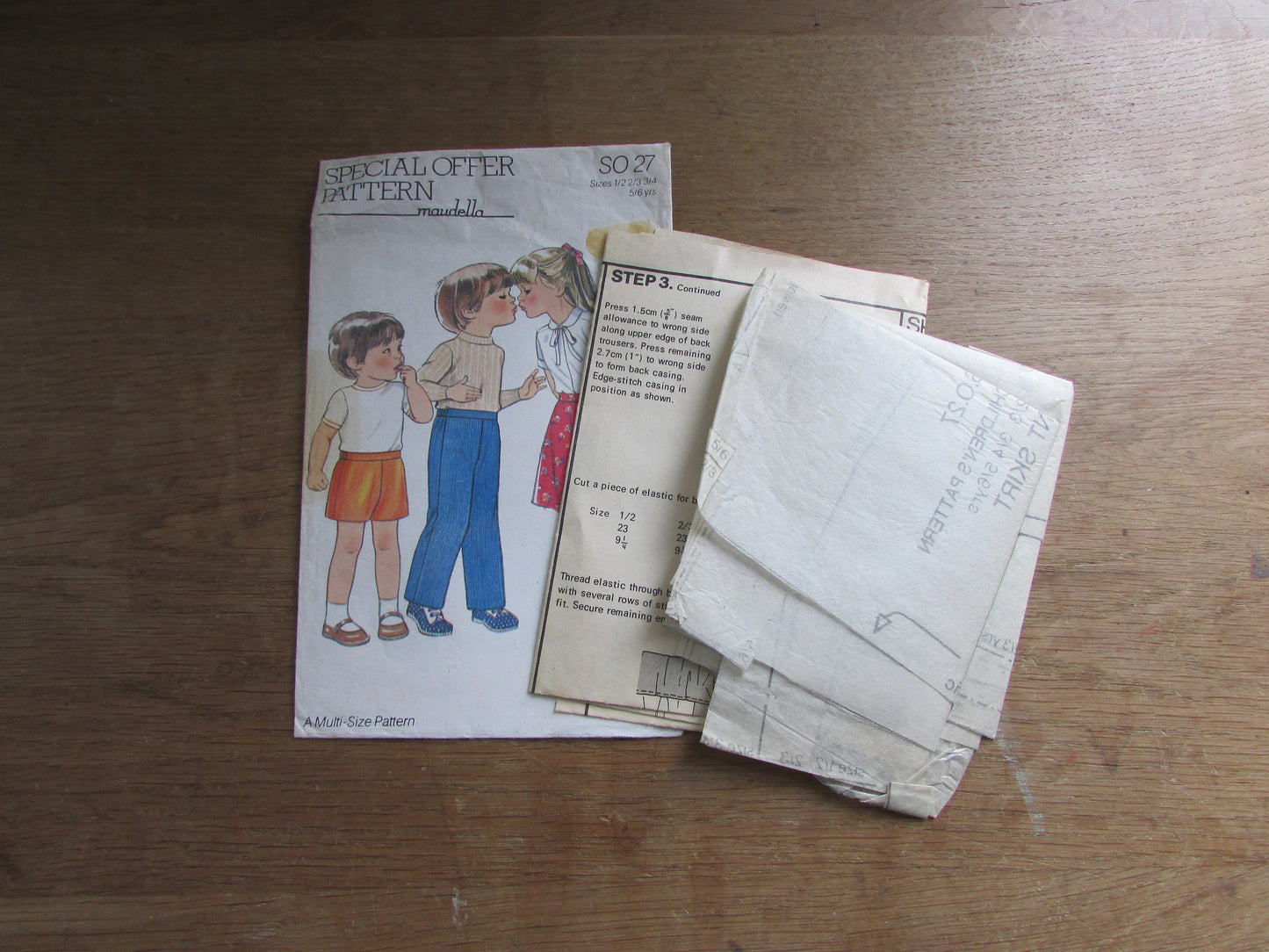 Part cut 1970s Maudella SO27 sewing pattern for child's trousers, shorts & skirt, ages 1/2 to 5/6 years (complete, cut to larger size)