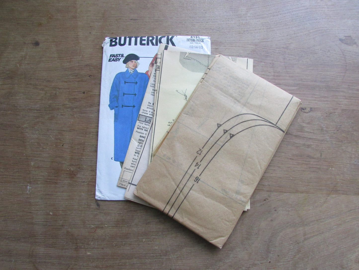 Uncut 1986 Butterick 4131 sewing pattern for misses' coat, sizes 12-16 (complete)