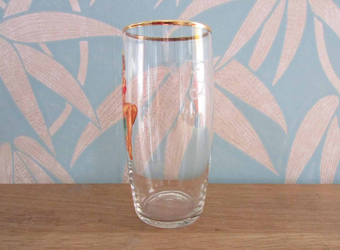 Mid-century gentleman's risqué pin-up girl pint glass, reverse decal