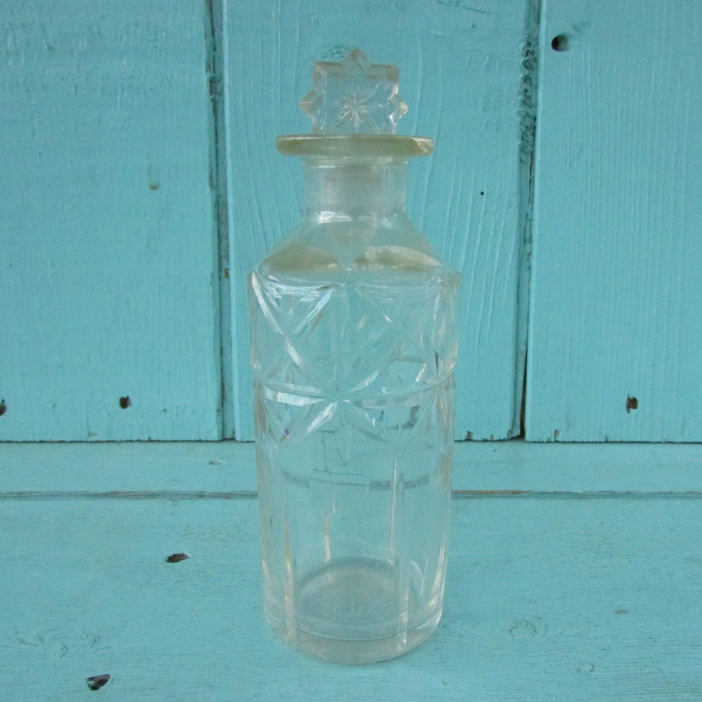 Vintage miniature cut glass perfume bottle with stopper