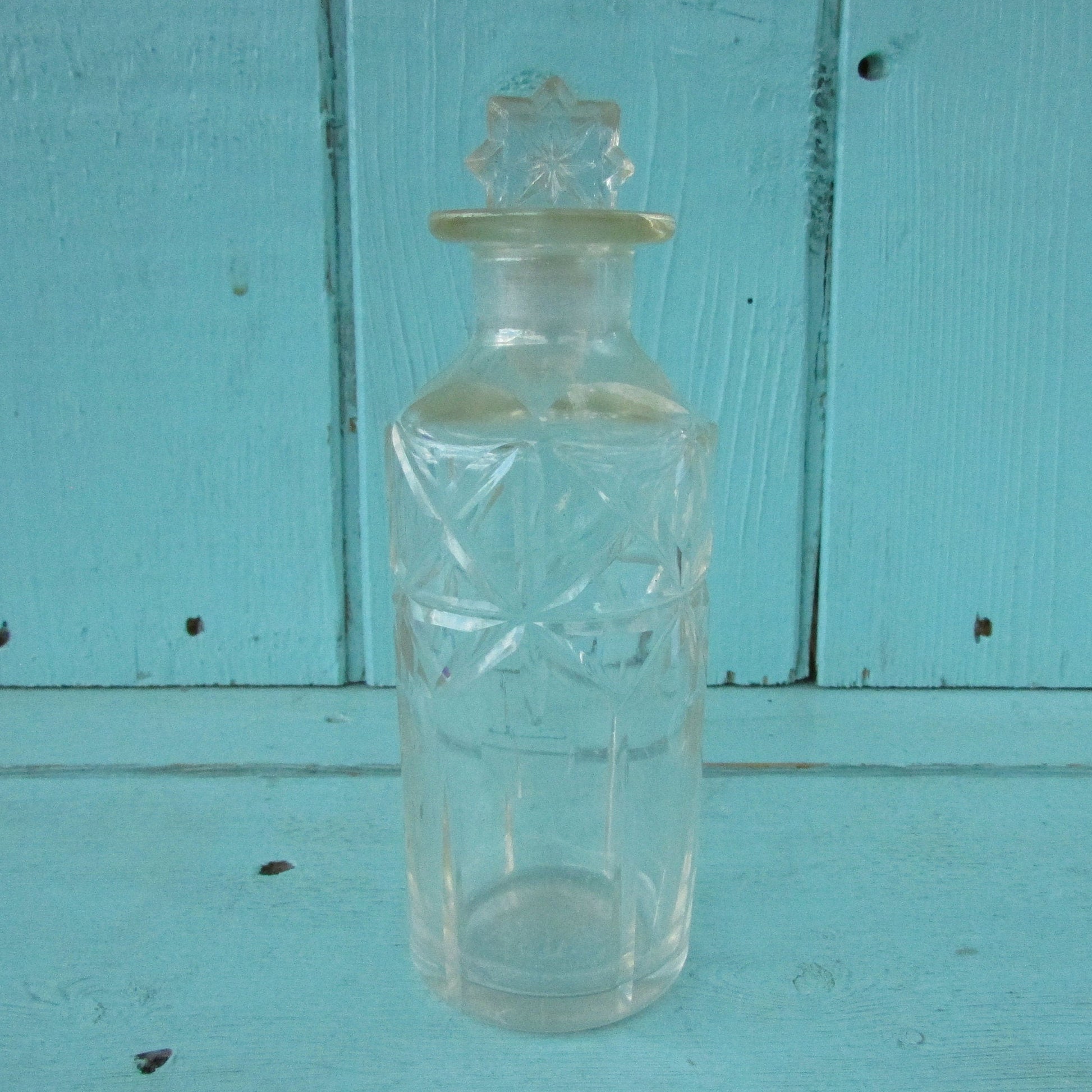 Vintage miniature cut glass perfume bottle with stopper