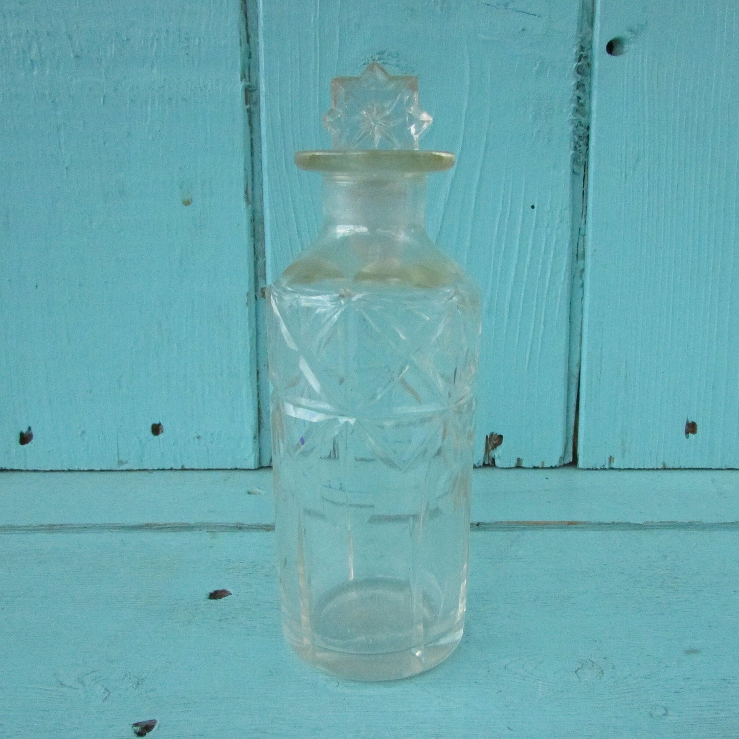 Vintage miniature cut glass perfume bottle with stopper