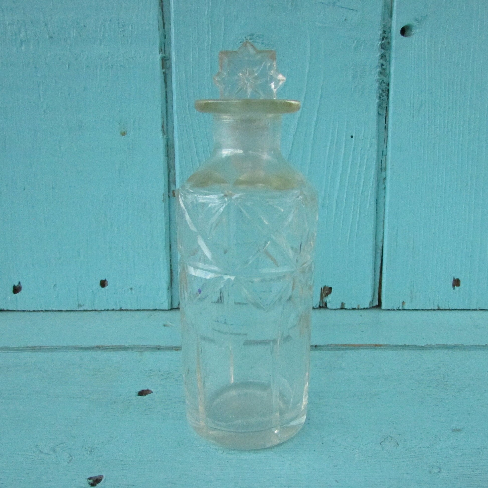 Vintage miniature cut glass perfume bottle with stopper