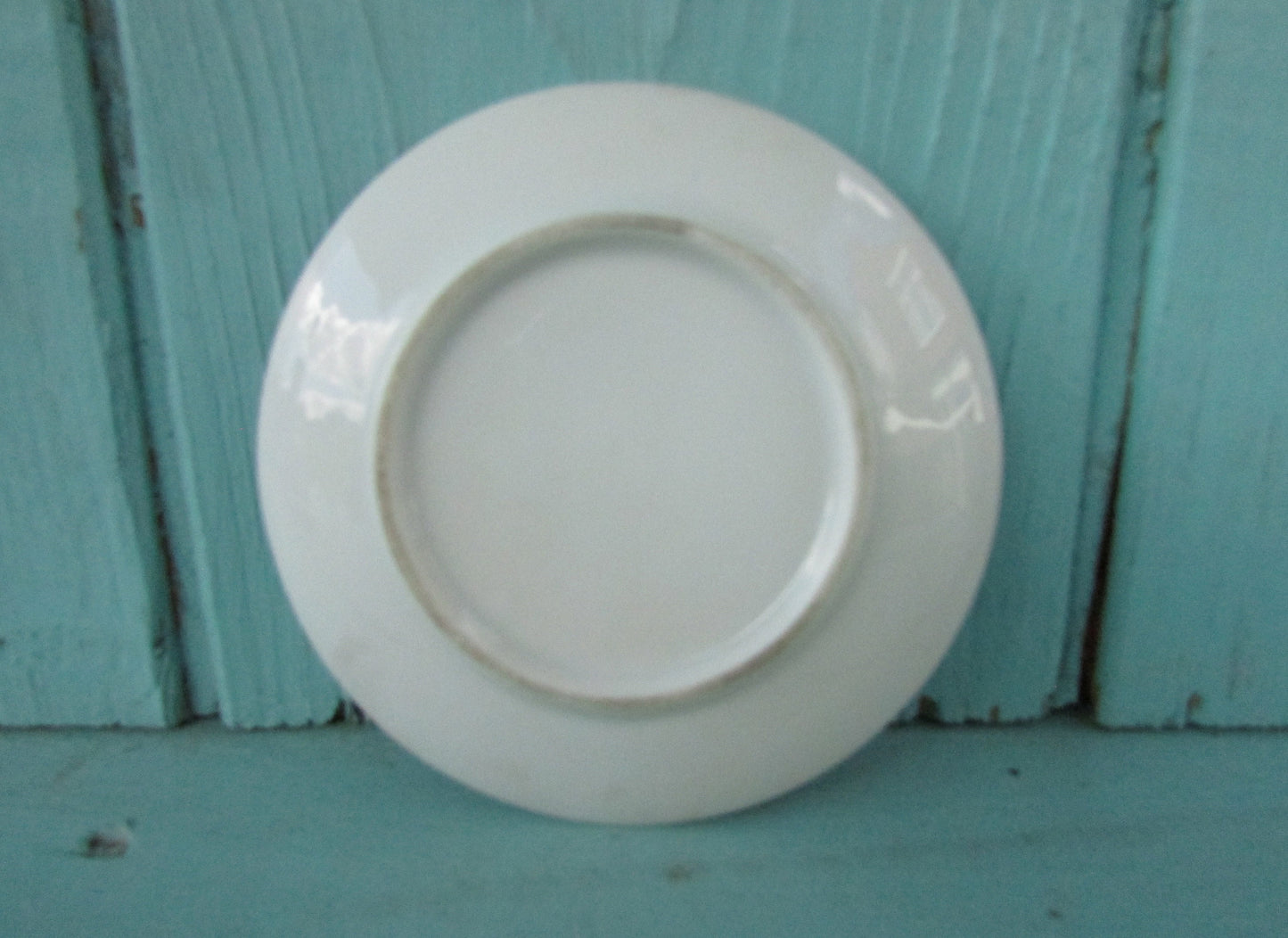 Pair of cute vintage Heidi & Peter miniature art plates with gilt edging