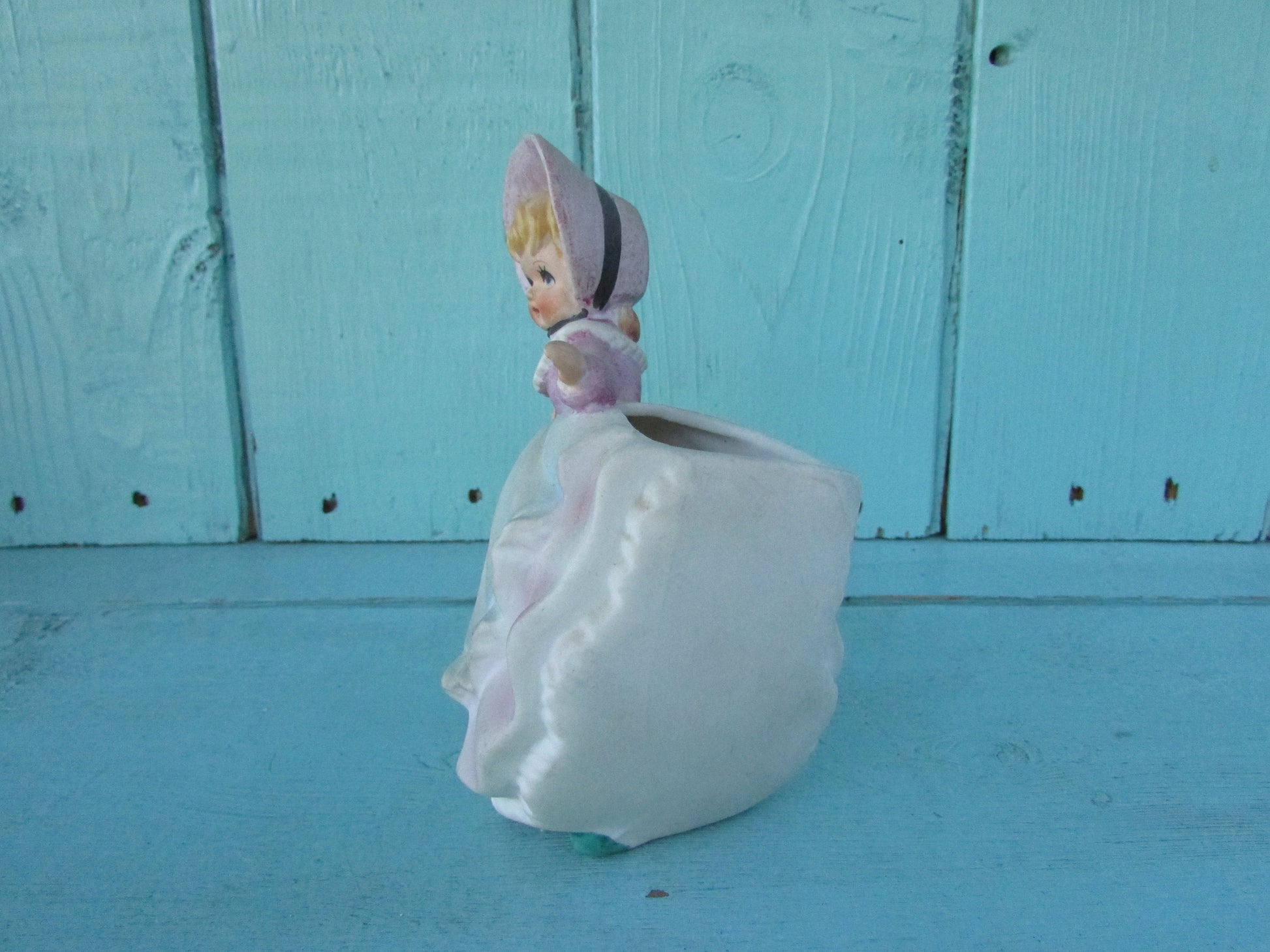 1960s Napco-style porcelain doll in bonnet with green parasol planter, marked Foreign