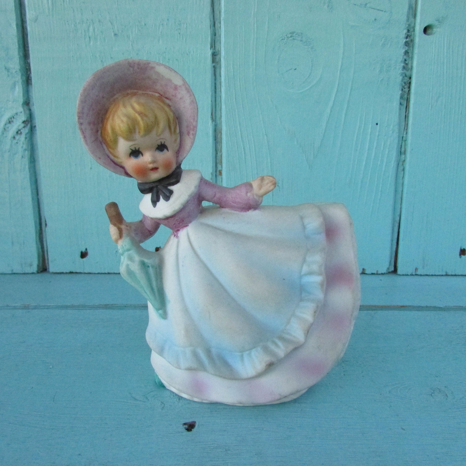 1960s Napco-style porcelain doll in bonnet with green parasol planter, marked Foreign
