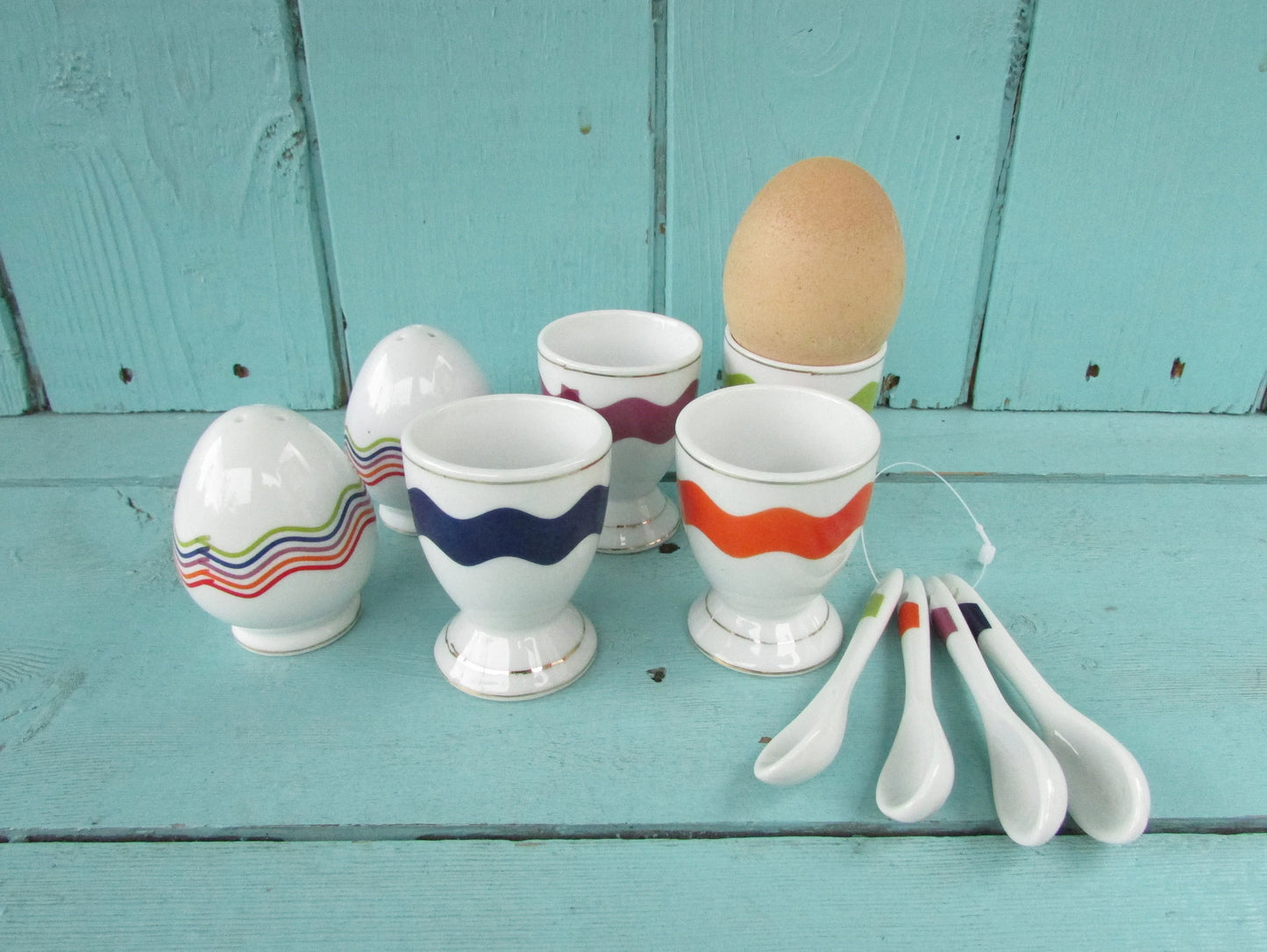 Vintage Motivex salt & pepper set and matching egg cups with coordinating ceramic spoons