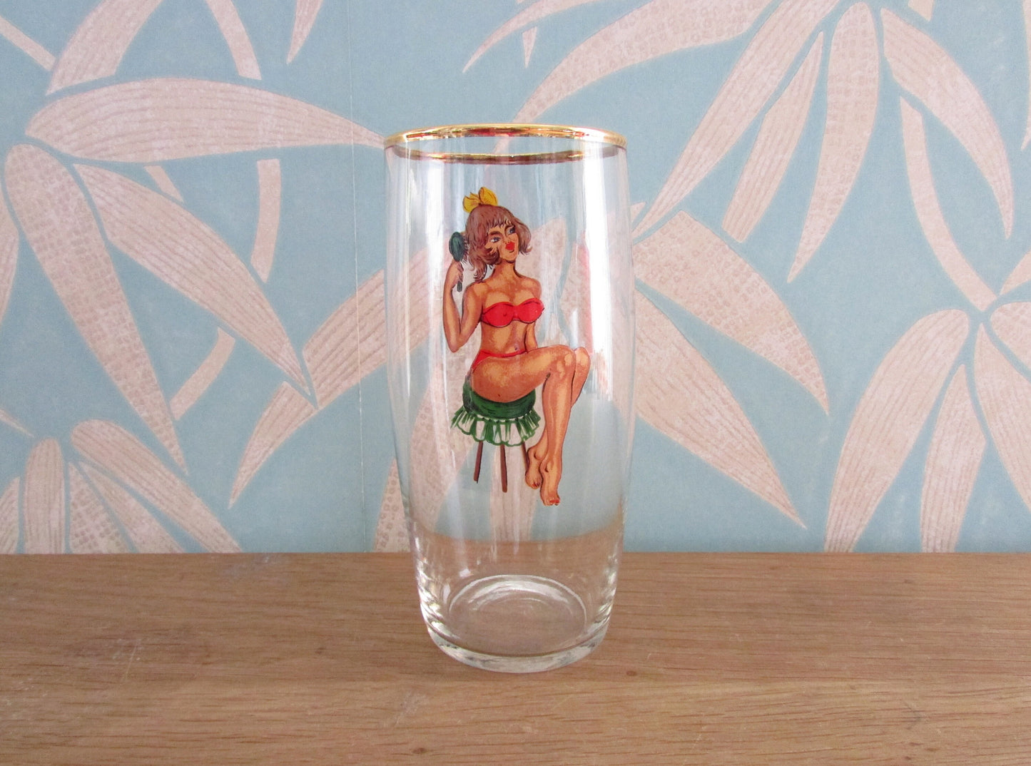 Mid-century gentleman's risqué pin-up girl pint glass, reverse decal