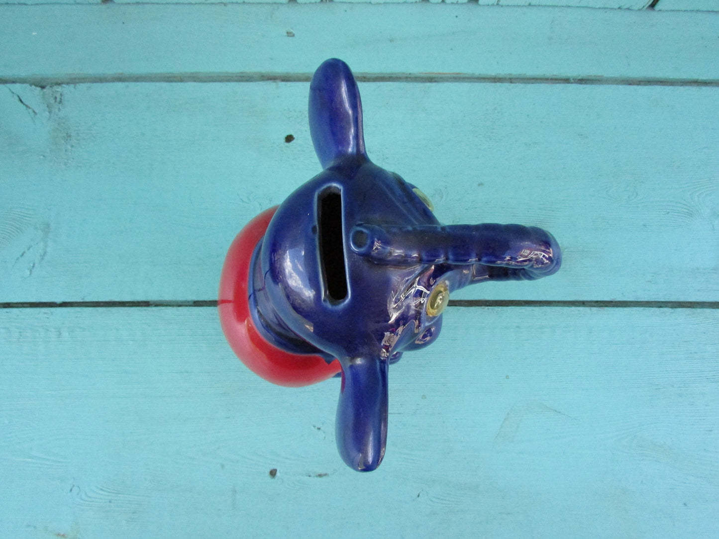 Vintage hand-painted blue ceramic elephant, with drum & googly eyes, money box